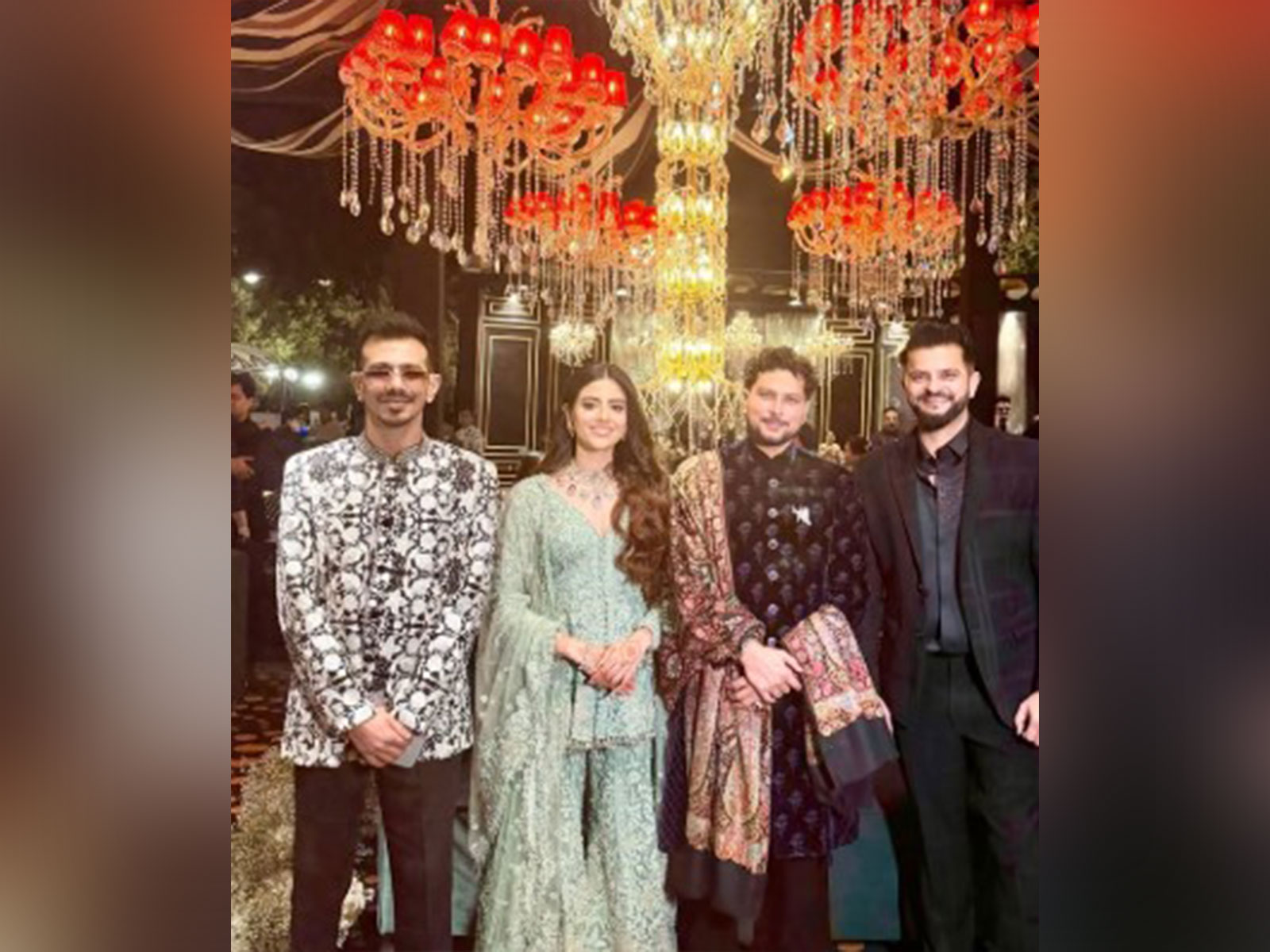 Kuldeep Yadav and his fiance Vanshika posing with Suresh Raina and Chahal (Image source: Suresh Raina's Instagram handle)