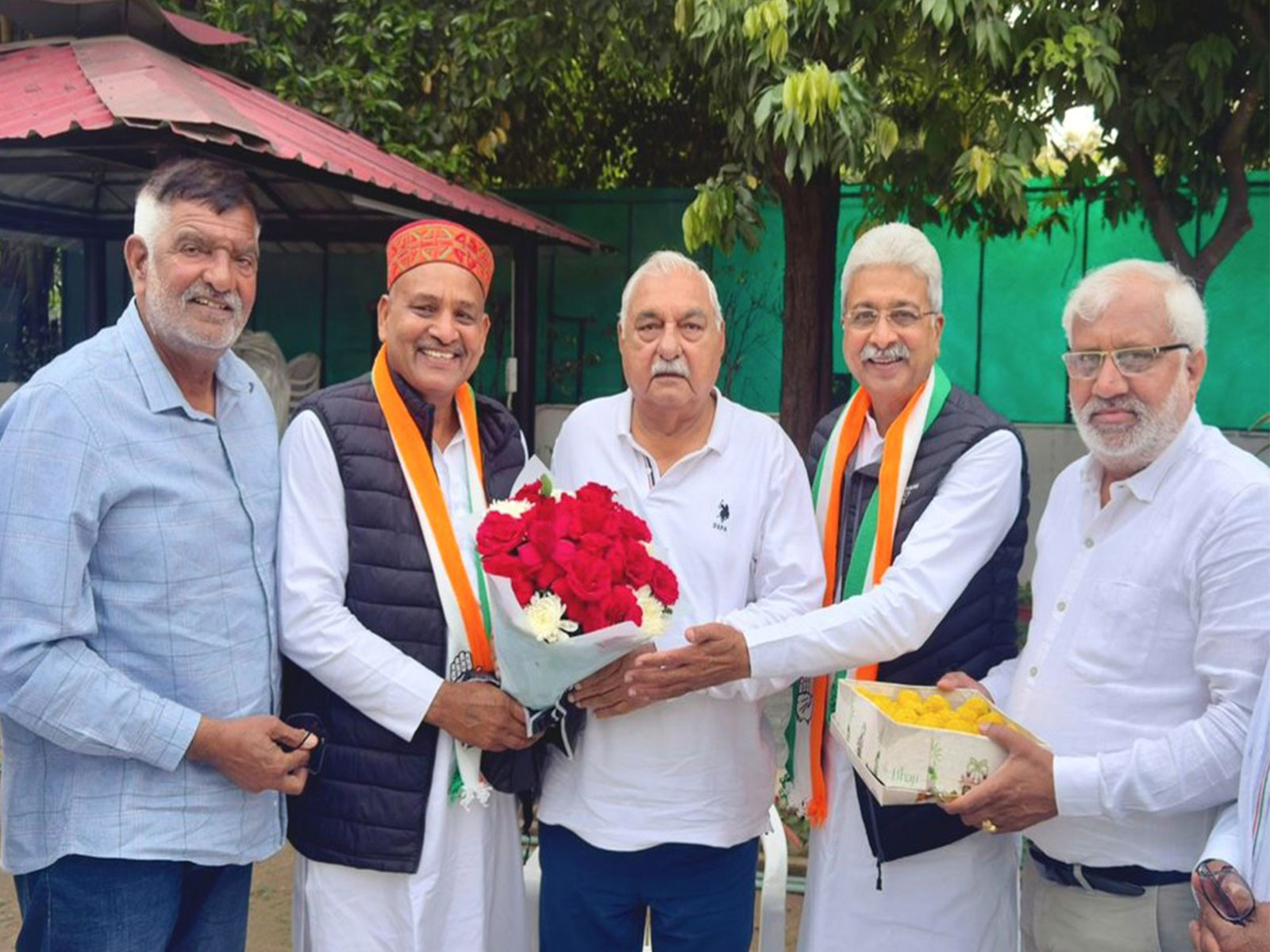 Senior Congress leader Bhupinder Singh Hooda with newly elected RS MP Karamvir Boudh (Photo/@BhupinderShooda)