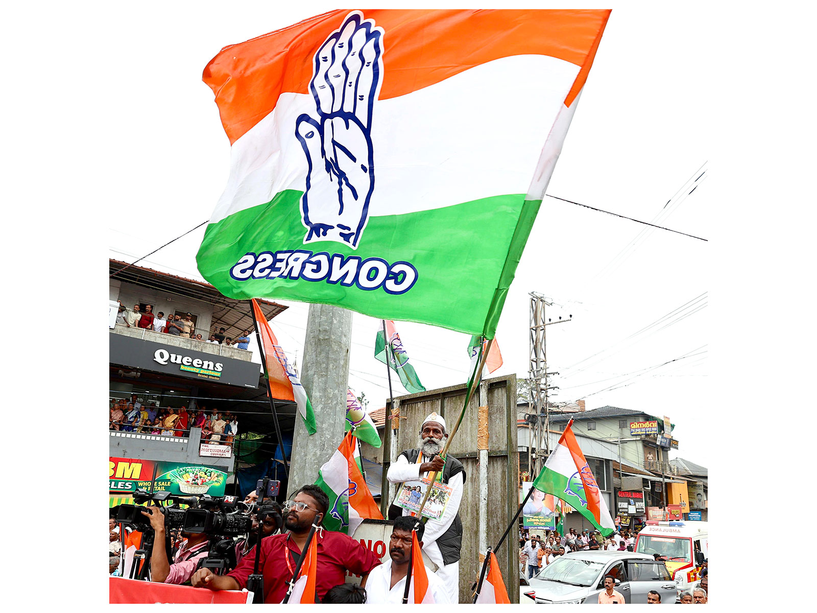 Supporters hold Congress flags at Mananthavady in Wayanad (File Photo: ANI)