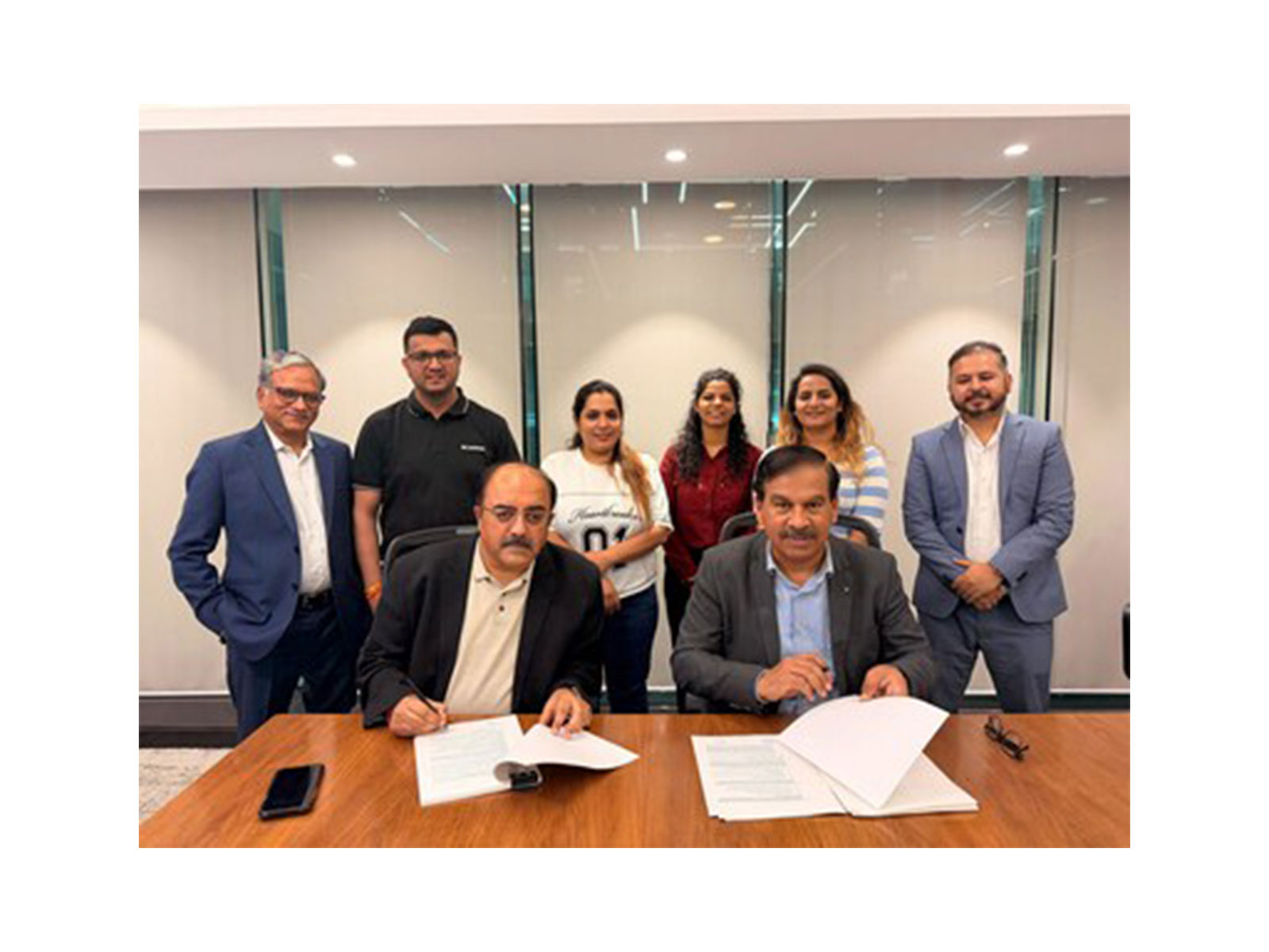 Representatives from Sunsure Energy and Jakson Engineering