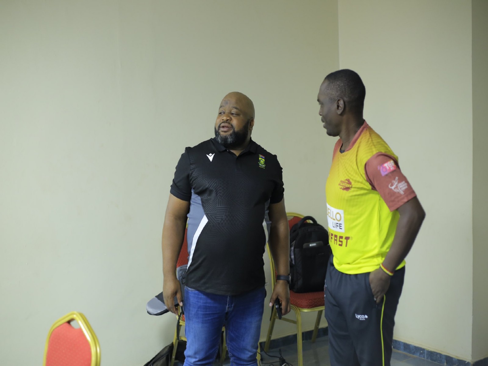 Edward Khoza (L) with Uganda Cricket official. (Photo/X@CricketUganda)