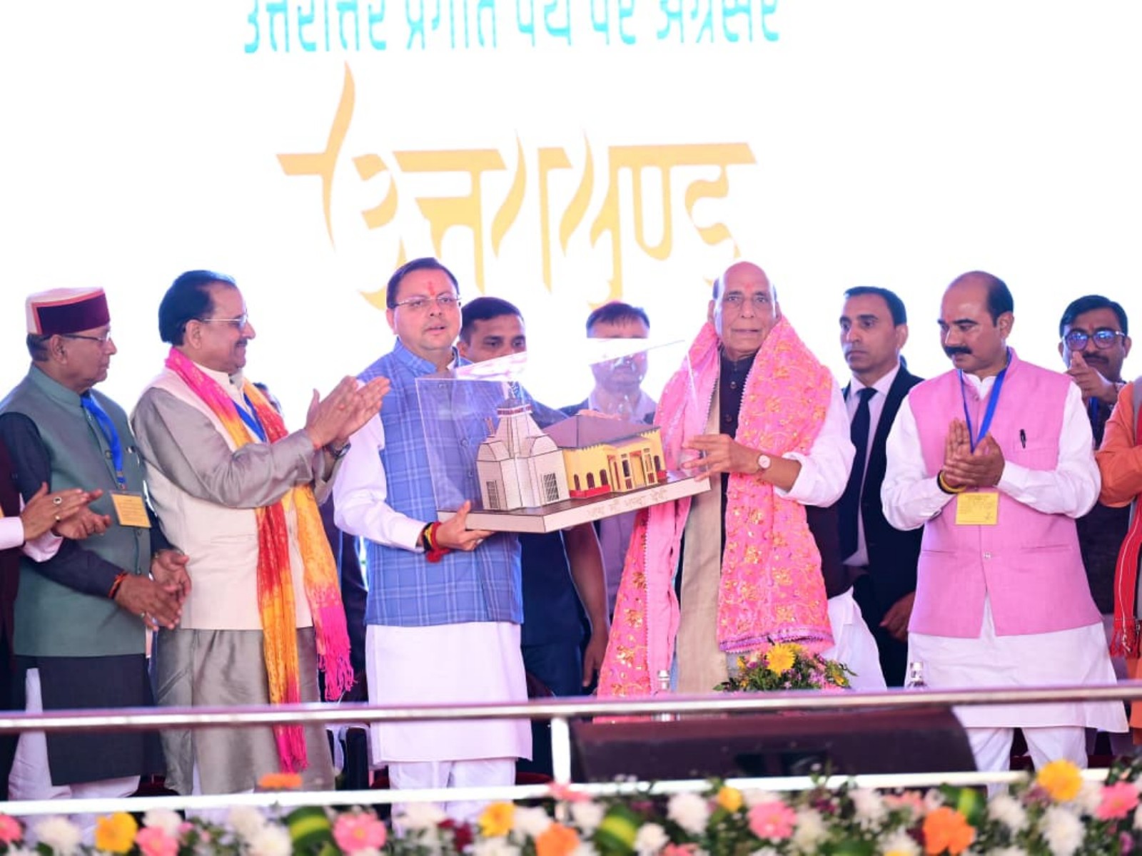 Defence Minister Rajnath Singh, Uttarakhand CM Pushkar Singh Dhami at the event (Photo/ANI)