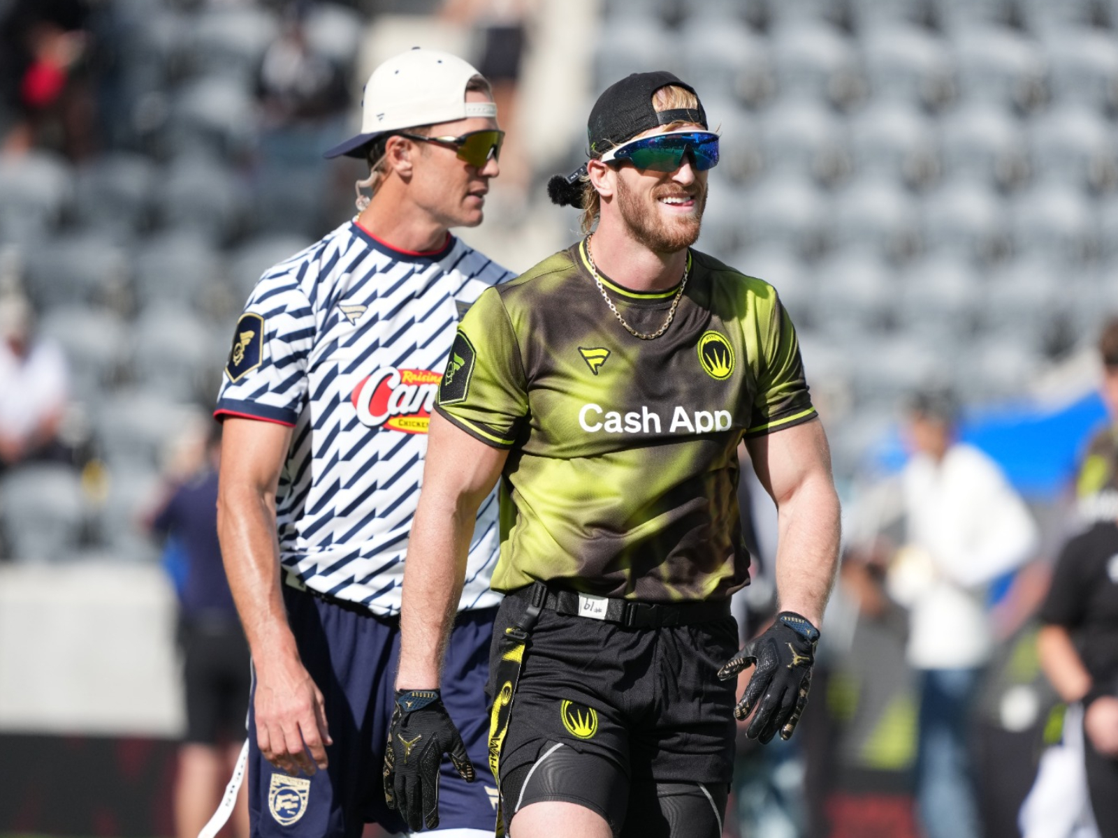 Tom Brady and Logan Paul. (Photo: Reuters)