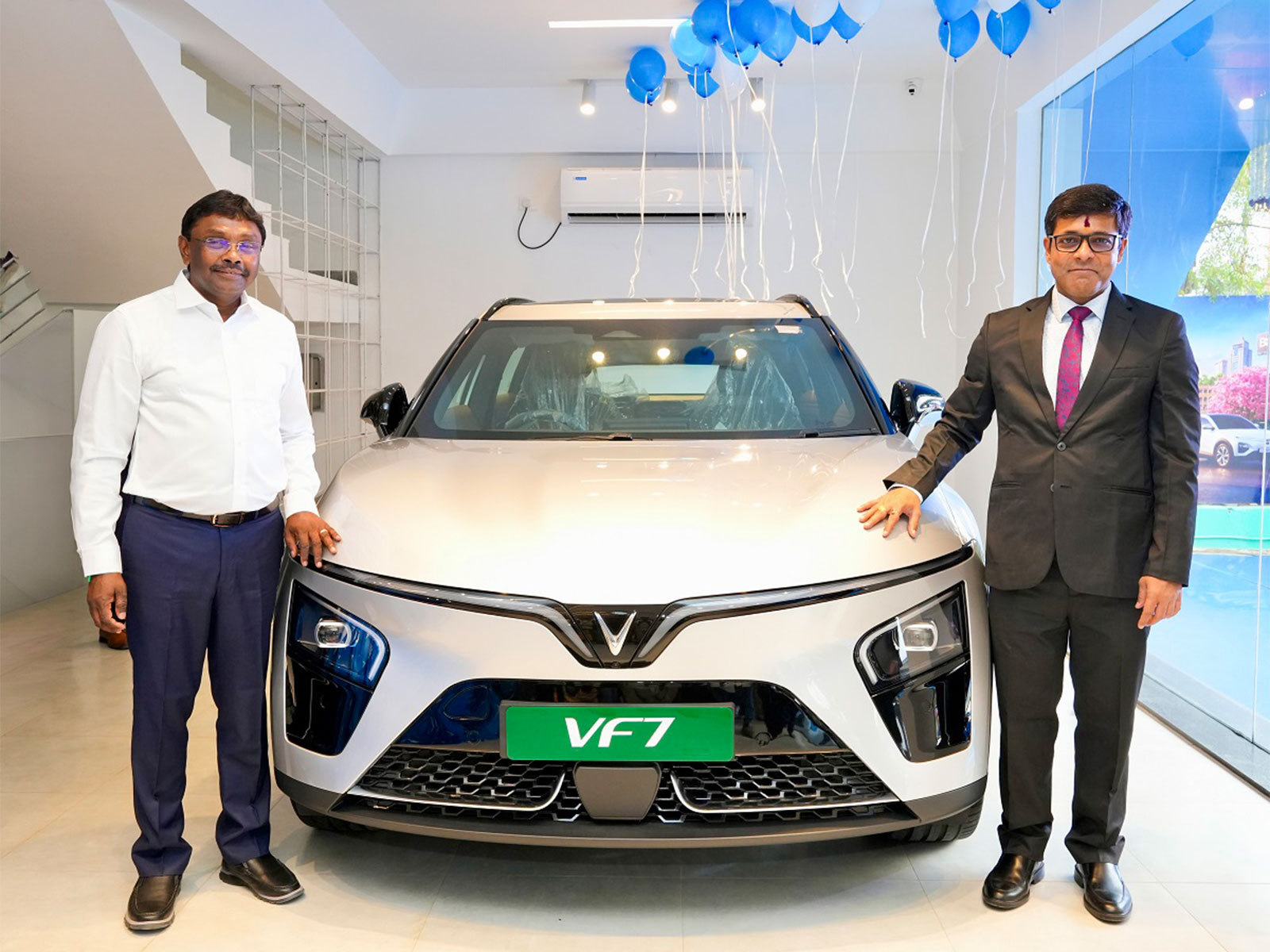 Tapan Ghosh (right) and Raaj Sekar, Dealer Principal of PPS Motors LLP, at the grand opening ceremony