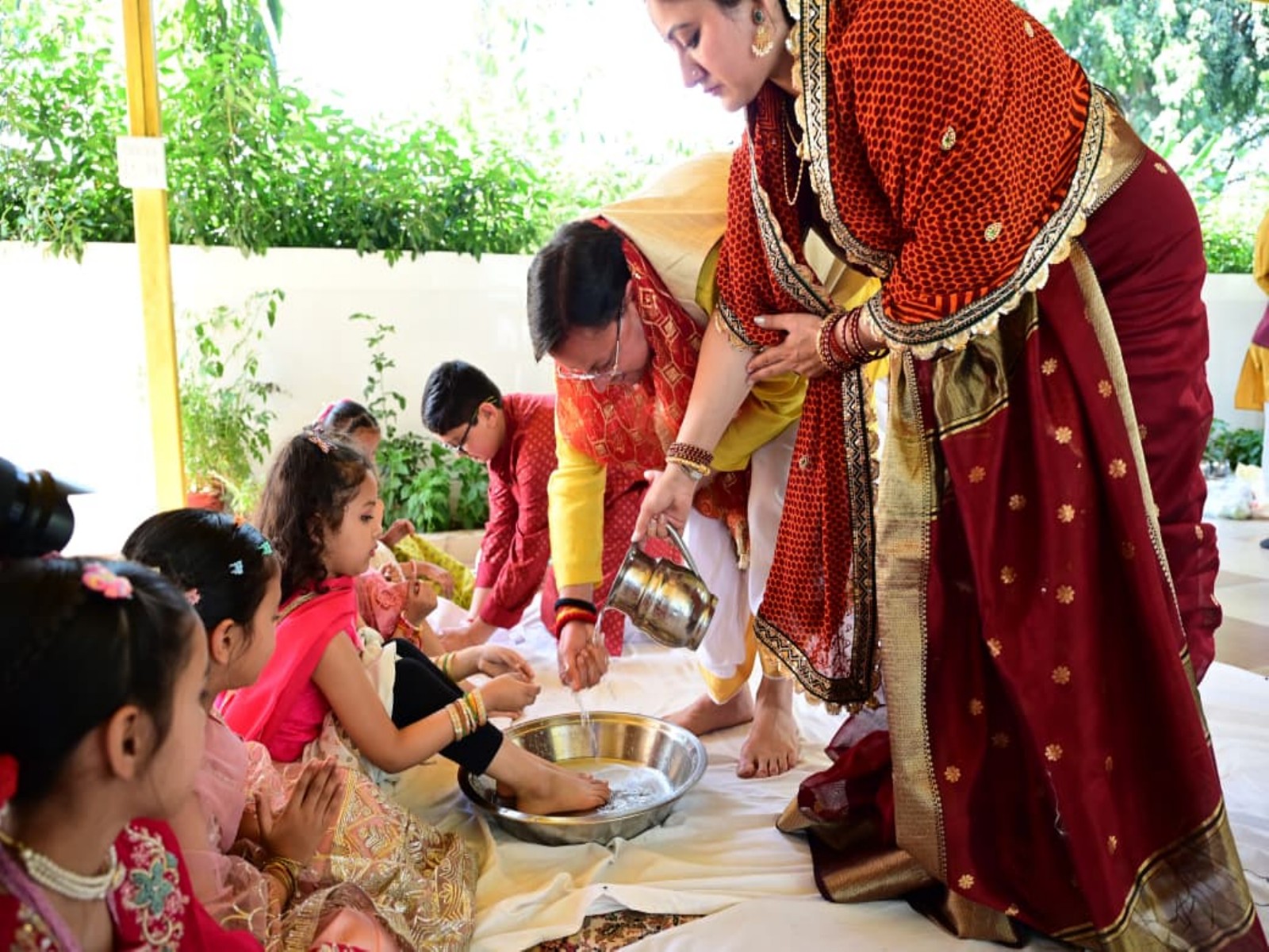 Uttarakhand CM Pushkar Singh Dhami performs Kanya Pujan along with wife (Photo/ANI)