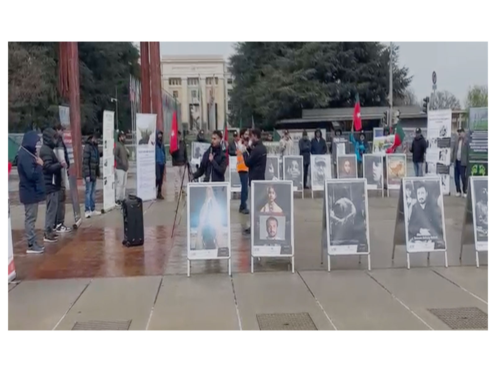 Participants view a photo exhibition organised by the Baloch National Movement near the Broken Chair Monument in Geneva, highlighting human rights violations in Balochistan. (Photo/ANI)