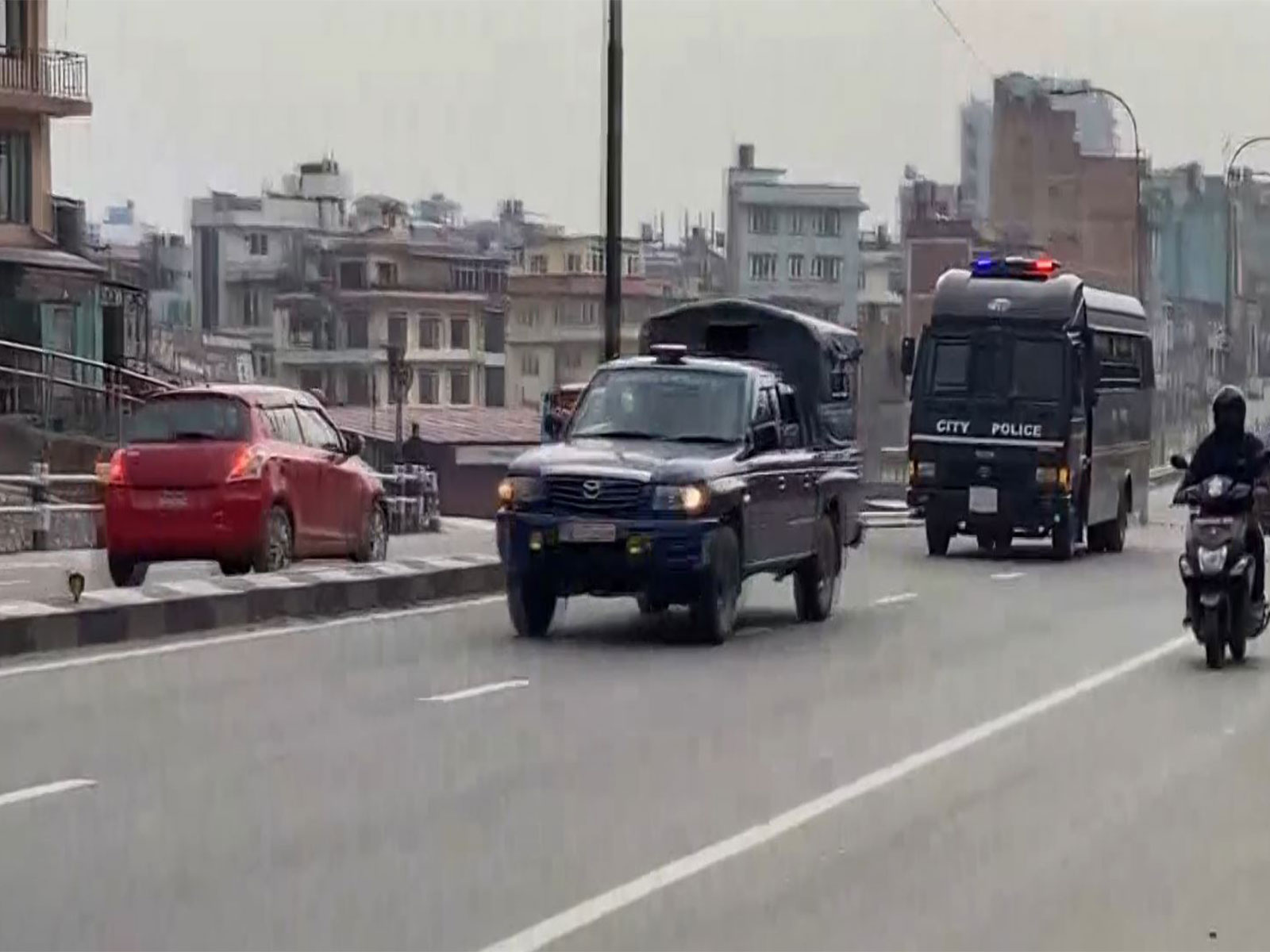 Police teams taking KP Sharma Oli in custody (Photo/ANI)