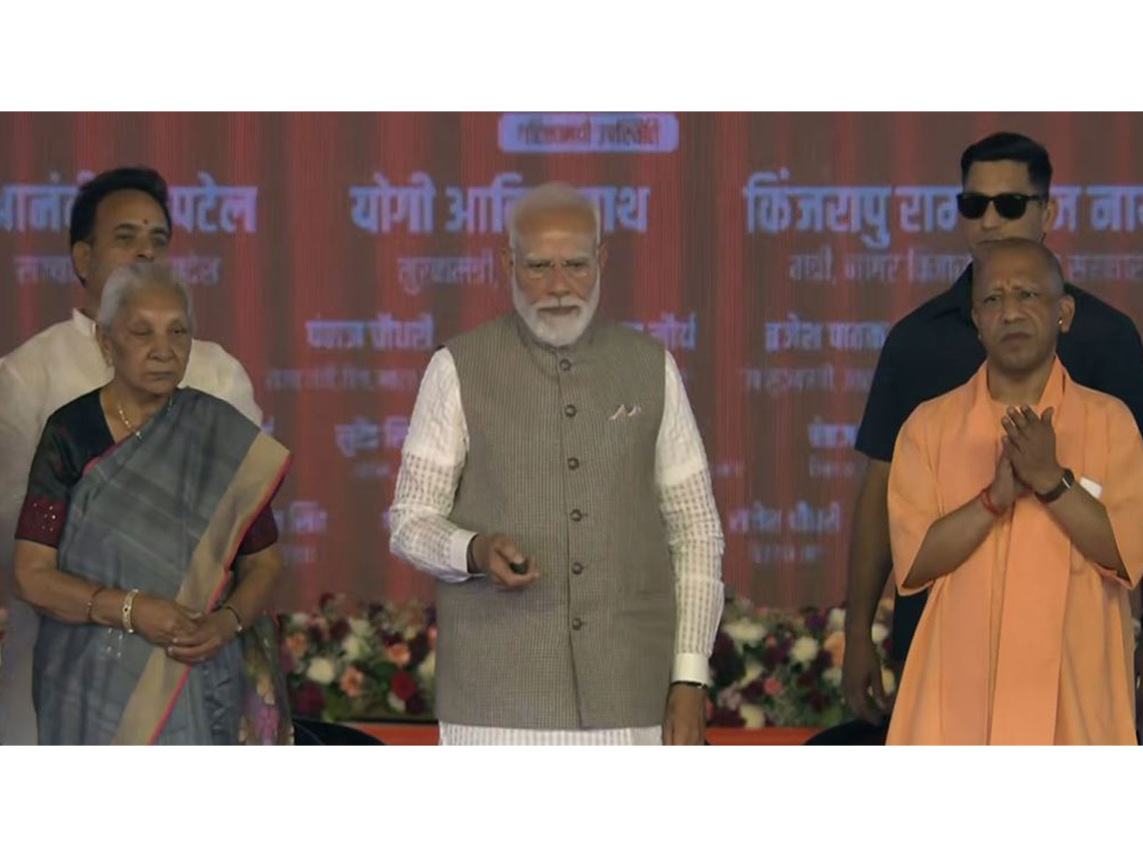 Prime Minister Narendra Modi with UP Governor Anandiben Patel and CM Yogi Adityanath (Photo/DD)