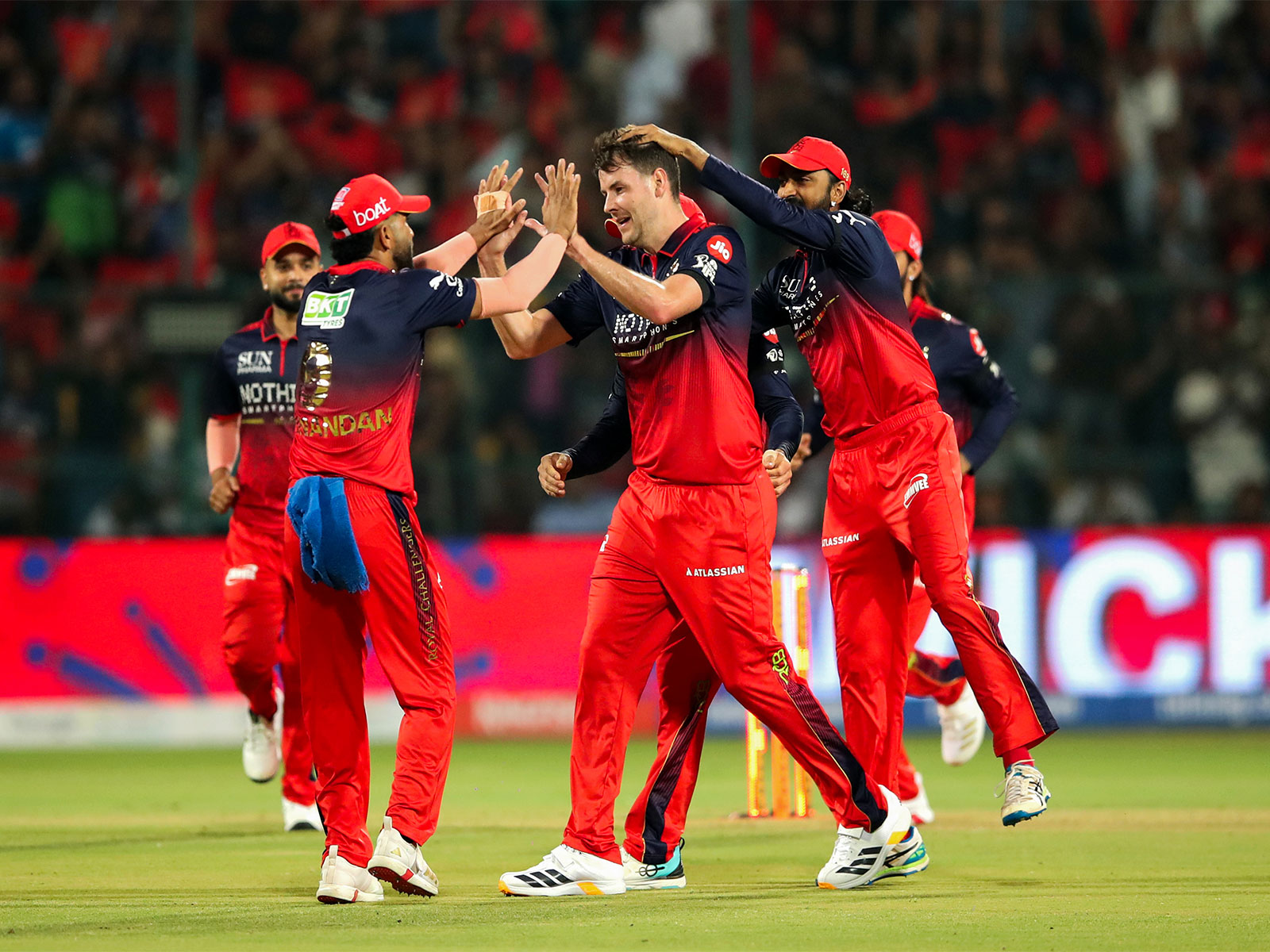 Jacob Duffy celebrating with RCB teammates (Photo: ANI)