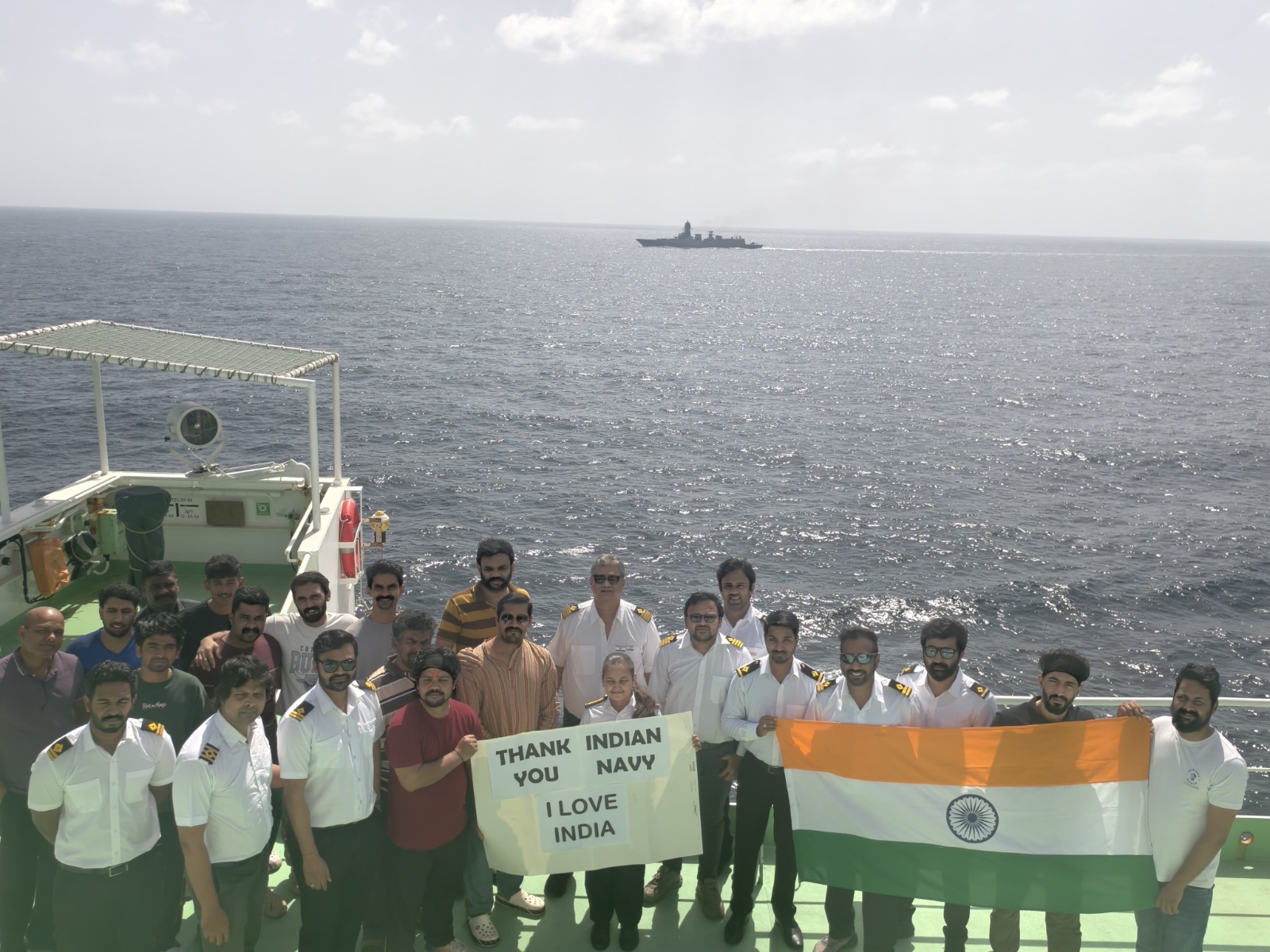 Crew with Indian flag and poster thanking Indian navy (Photo/ Special arrangements)