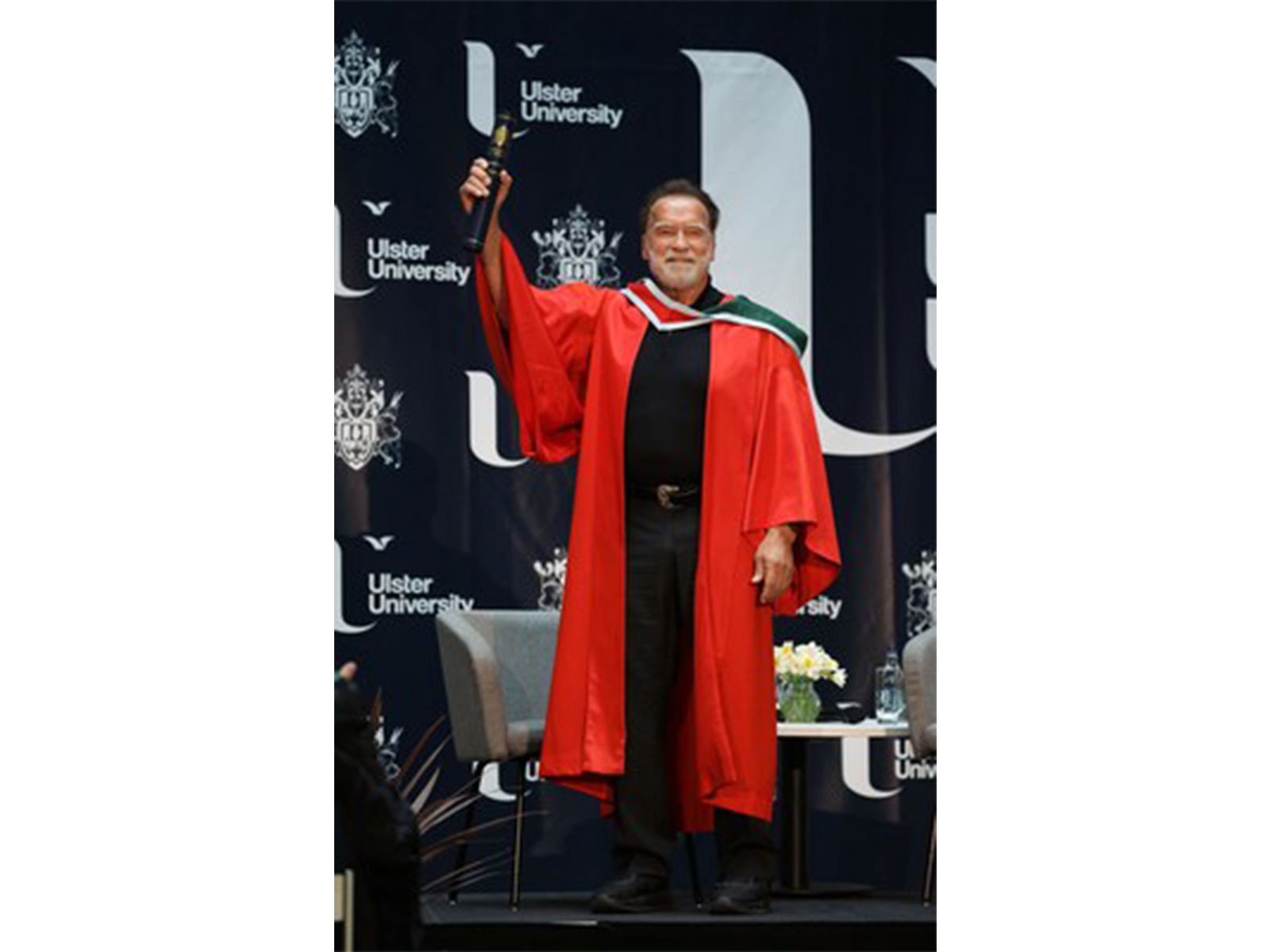 Dr Arnold Schwarzenegger pictured receiving his honorary doctorate from Ulster University, Belfast