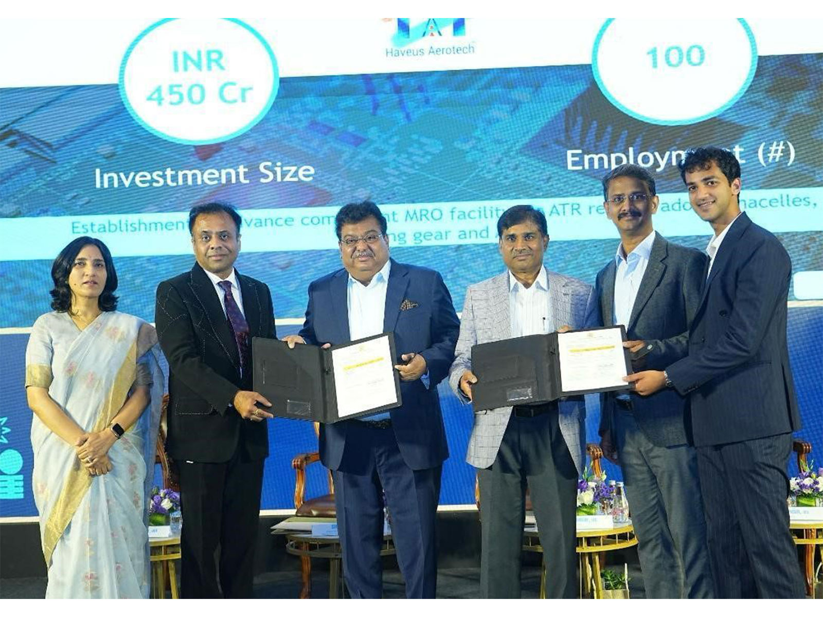 From left to right: Mrs Gunjan Krishna, Commissioner Industries Karnataka, with Shri MB Patil, and officials alongside Haveus Aerotech leadership at the industry event