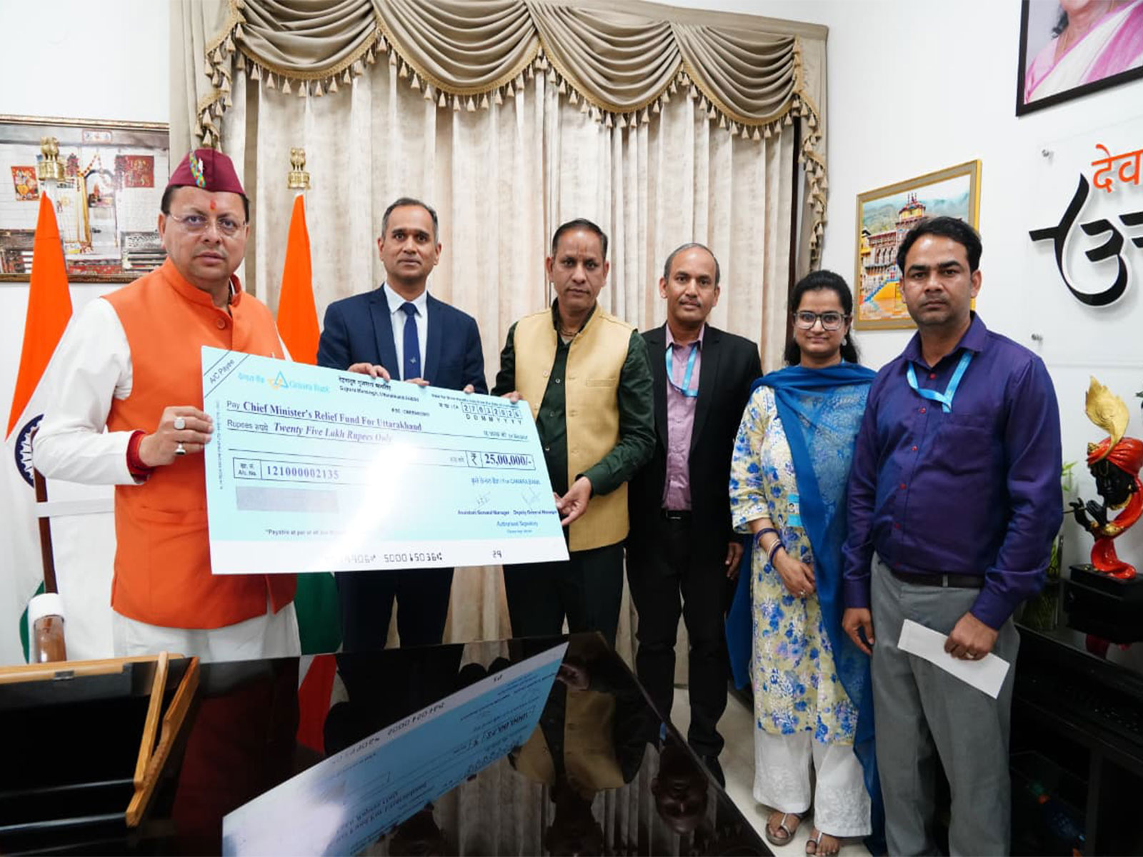 Canara Bank donates Rs 25 lakh to Uttarakhand CM Relief Fund (Photo/Uttarakhand CMO) 