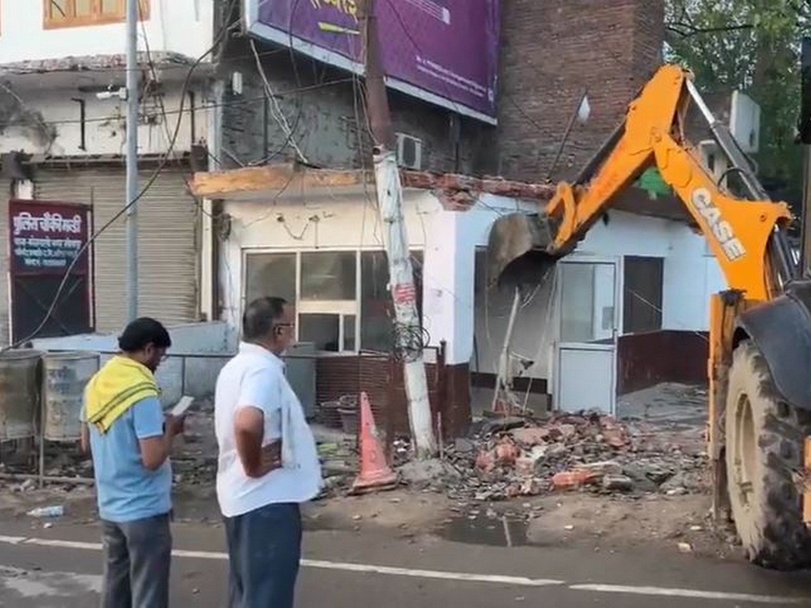 Bulldozer operations have commenced for the widening of the Captain Manoj Pandey intersection. (Photo/ANI)