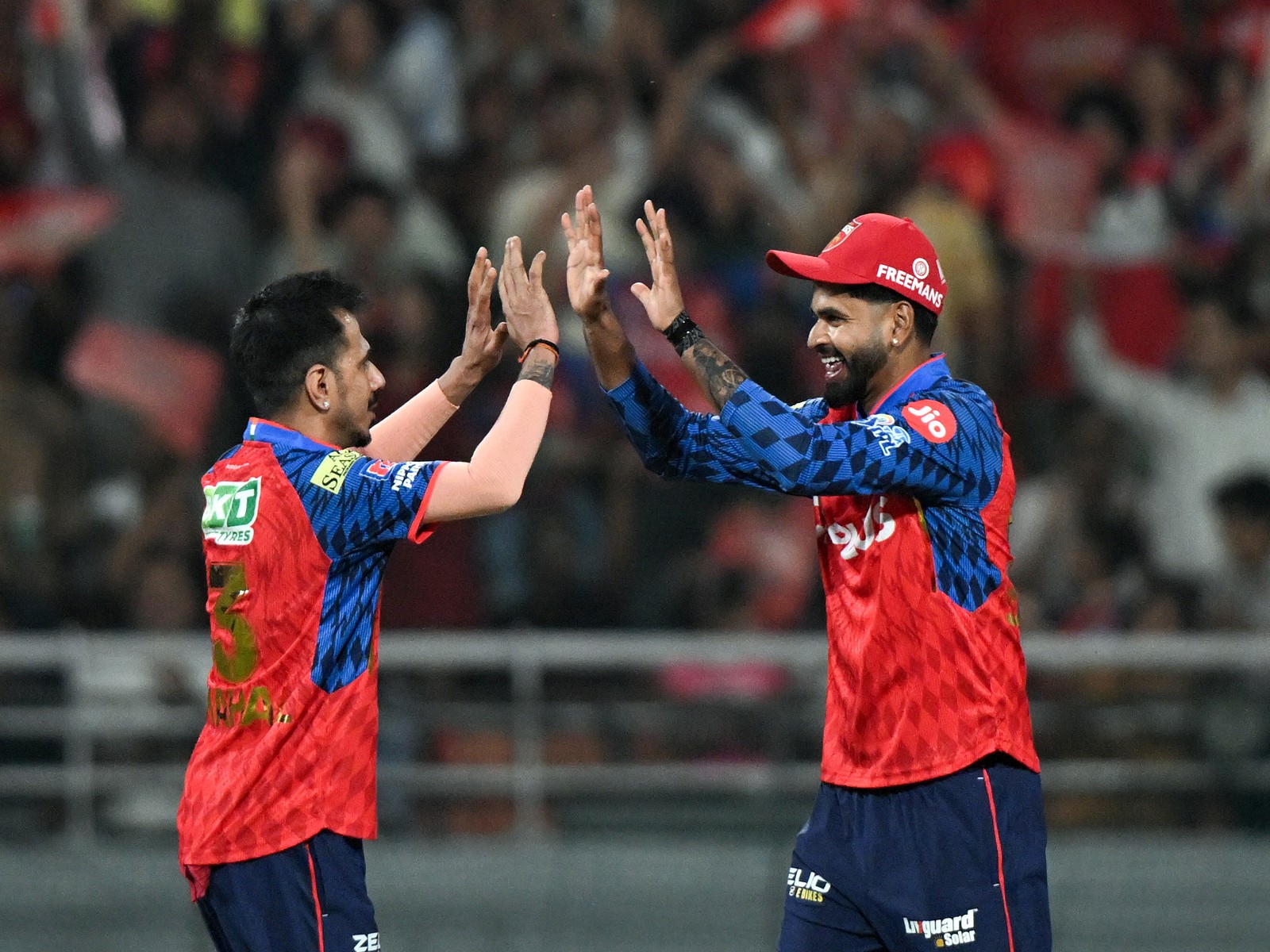 Yuzvendra Chahal (L) and Shreyas Iyer (R) celebrating (Photo/ANI)