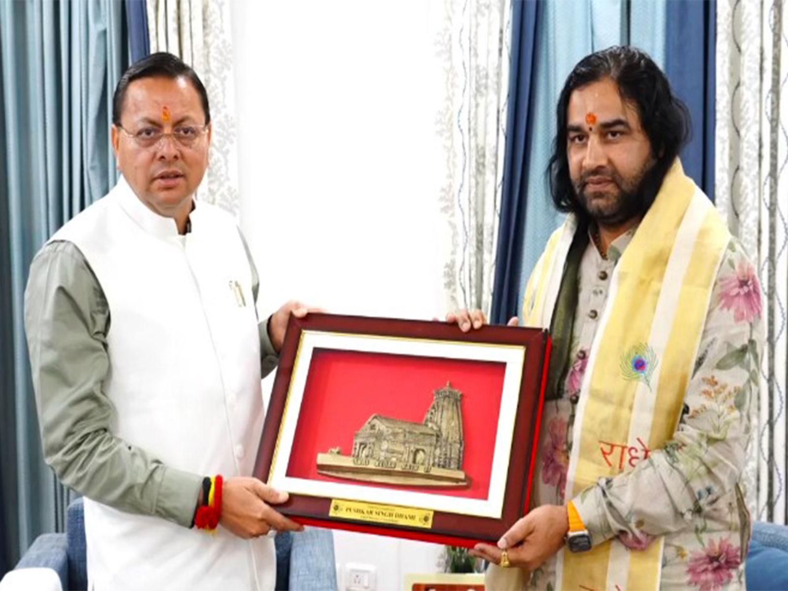 CM Dhami meets spiritual leader Devkinandan Thakur (Photo/ANI)