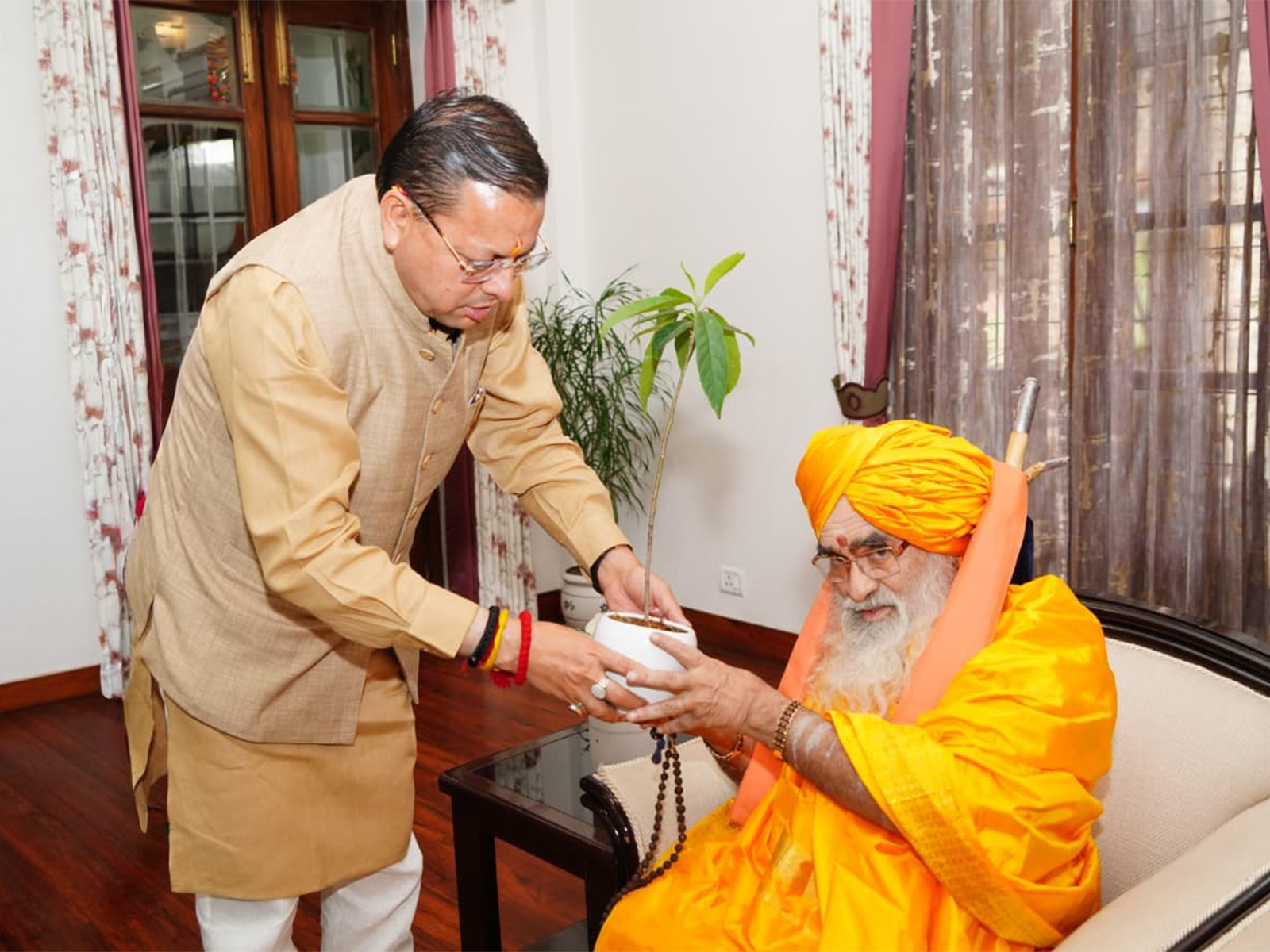 Uttarakhand CM Pushkar Singh Dhami meets Kedarnath Rawal  (Photo/ANI)