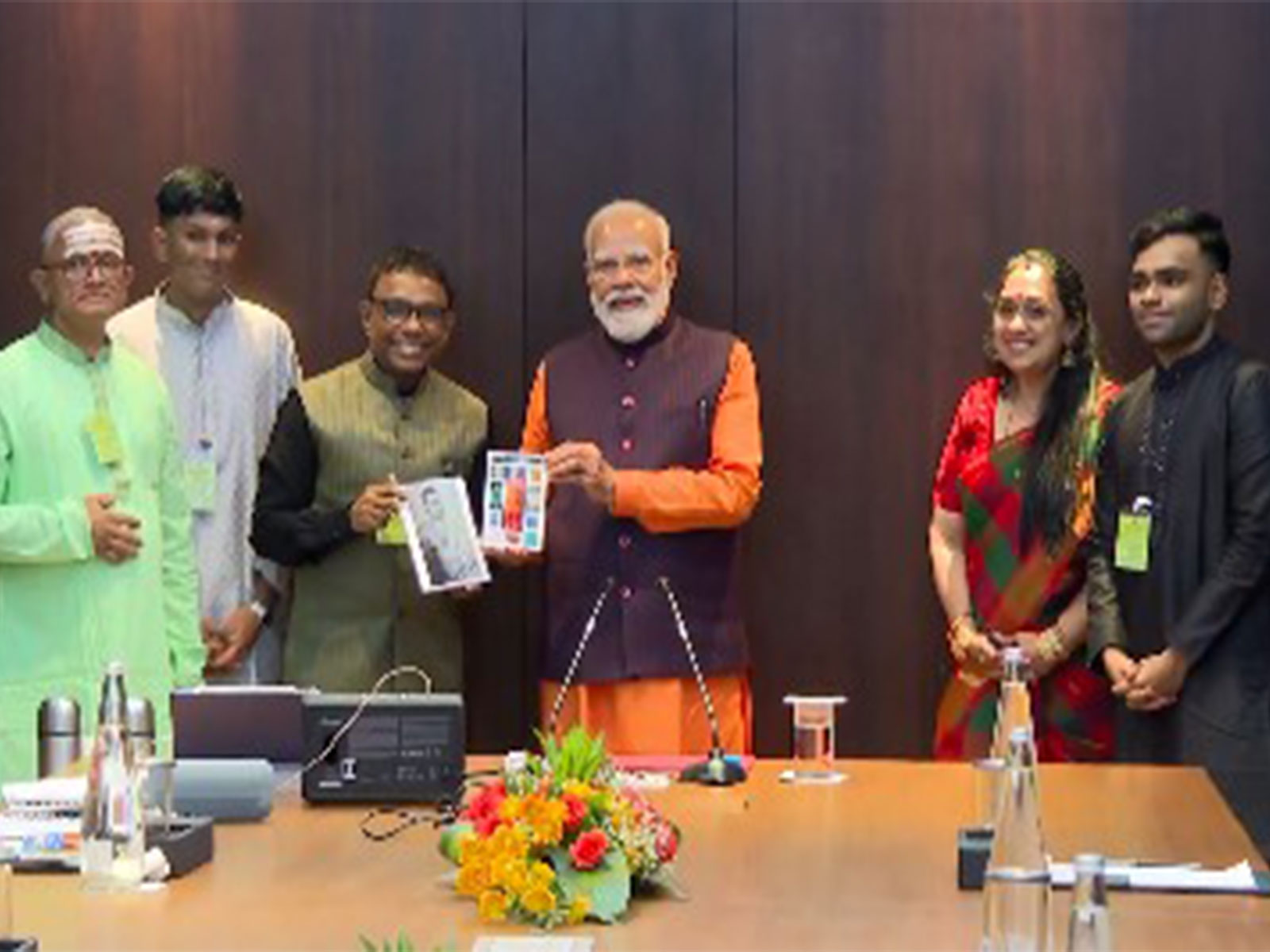 PM Modi with music composer Ramesh Vinayakam and his family (Photo/ANI)