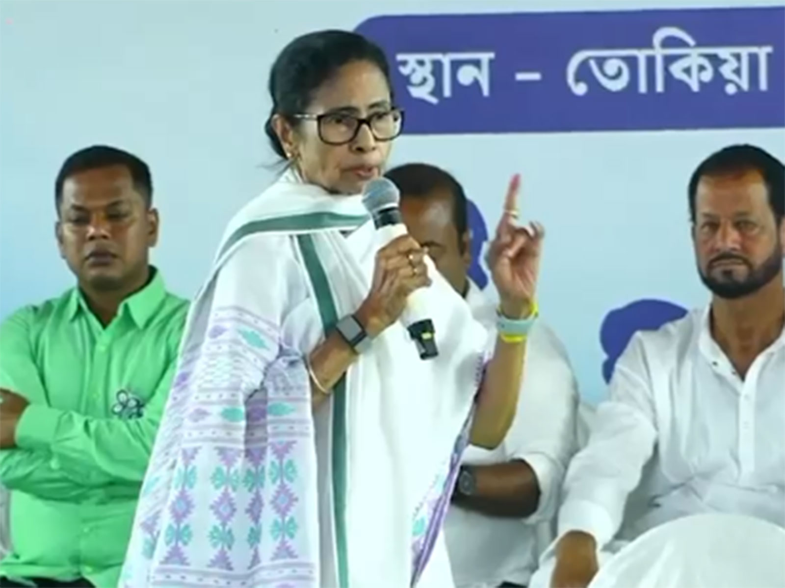 Mamata Banerjee addressing a gathering in Murshidabad ahead of West Bengal Assembly polls. (Photo/ANI)