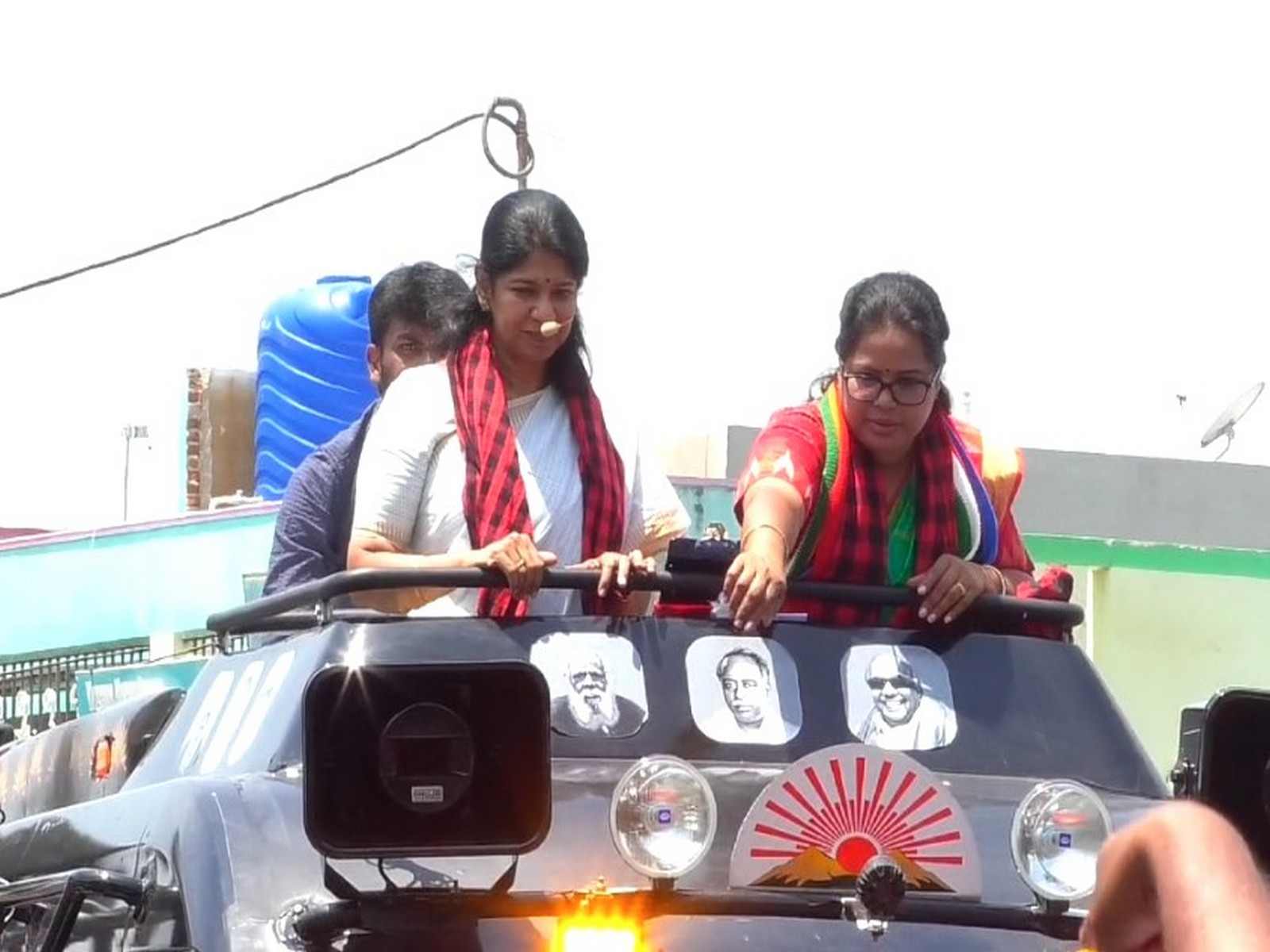 DMK MP Kanimozhi addressing gathering at Pudupettai Sandhaimedu near Natrampalli in Tirupattur district (Photo/ANI)