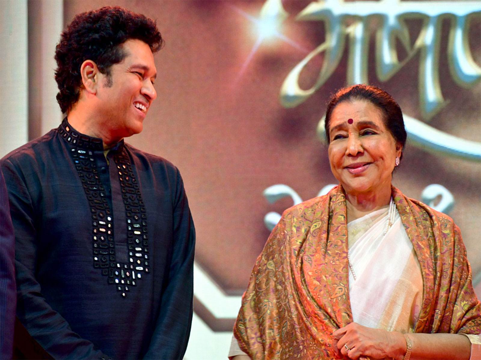 Sachin Tendulkar (left) and Asha Bhosle (right) (Photo: ANI)