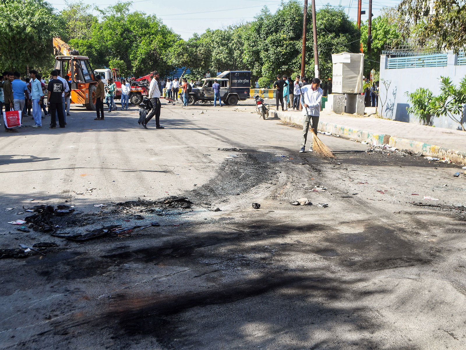 Employees of a company protest demanding a salary increment in Noida (Photo/ANI)
