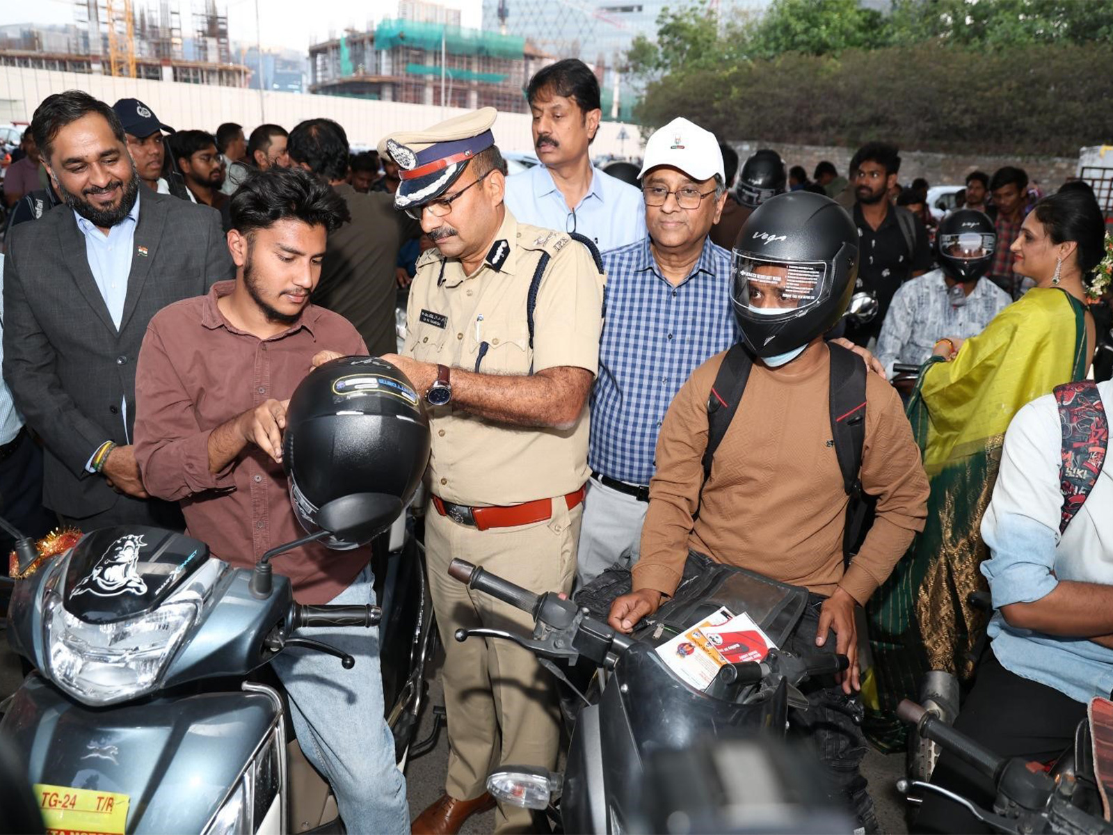 Helmet Distribution Drive Held in Hyderabad to Promote Road Safety