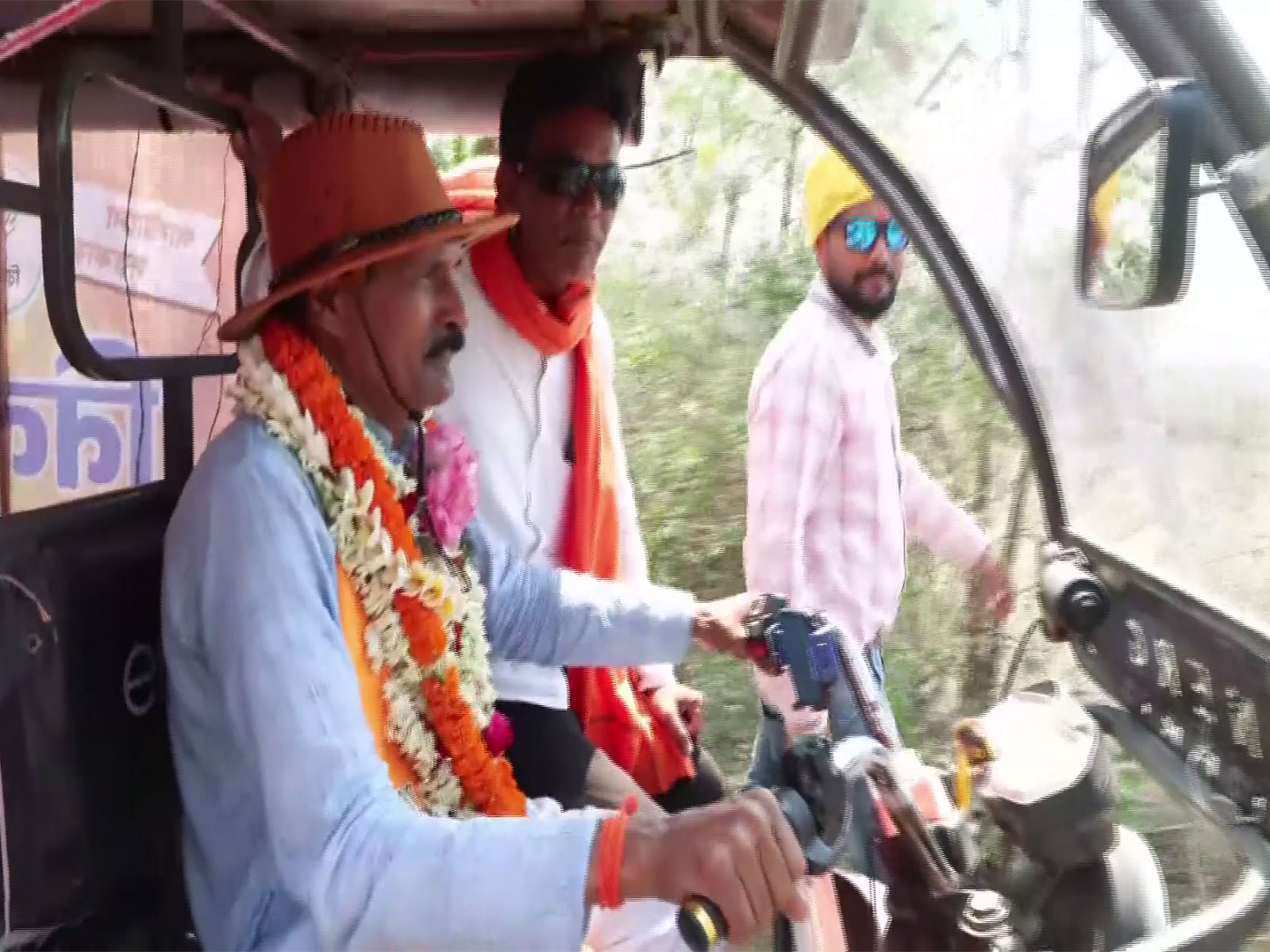 BJP candidate Niladri Shekhar Dana from Bankura constituency campaigns in E-rickshaw (Photo/ANI