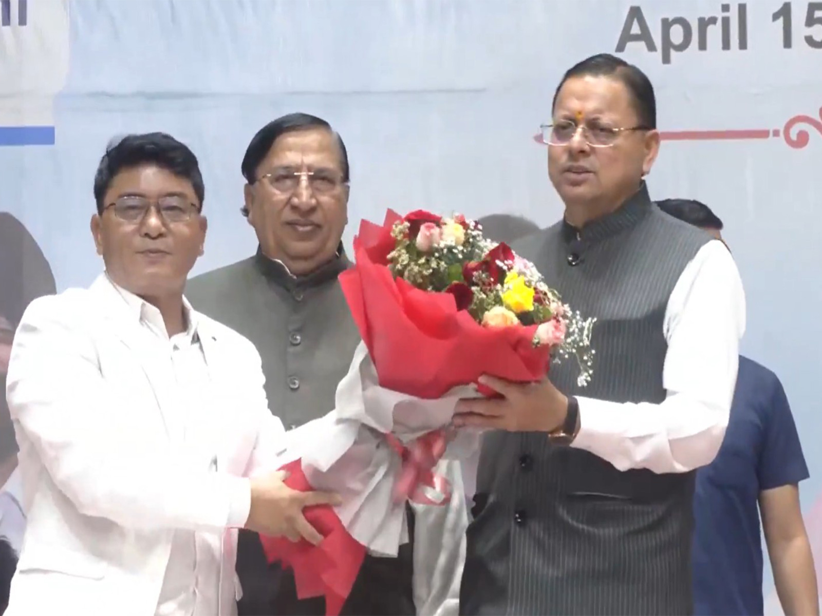 Pushkar SIngh Dhami (right) (Photo: ANI)