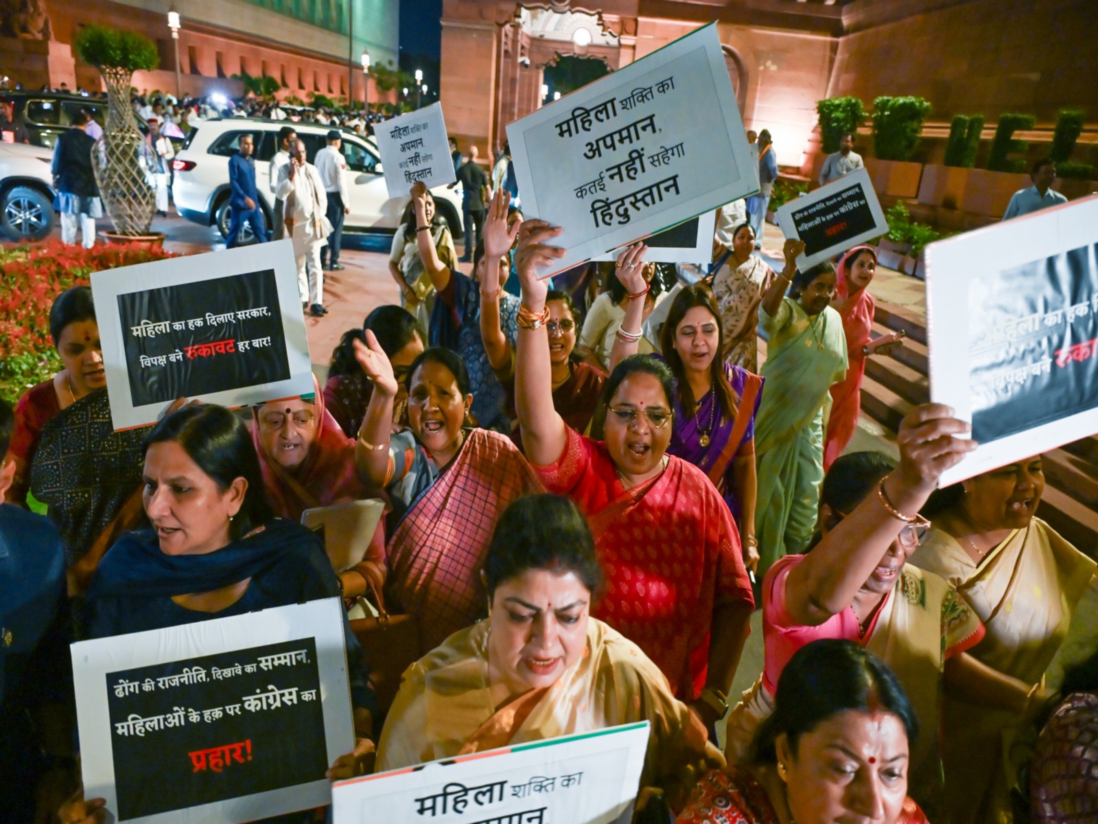 Women NDA MPs protest in the Parliament premises today (Photo/ANI)