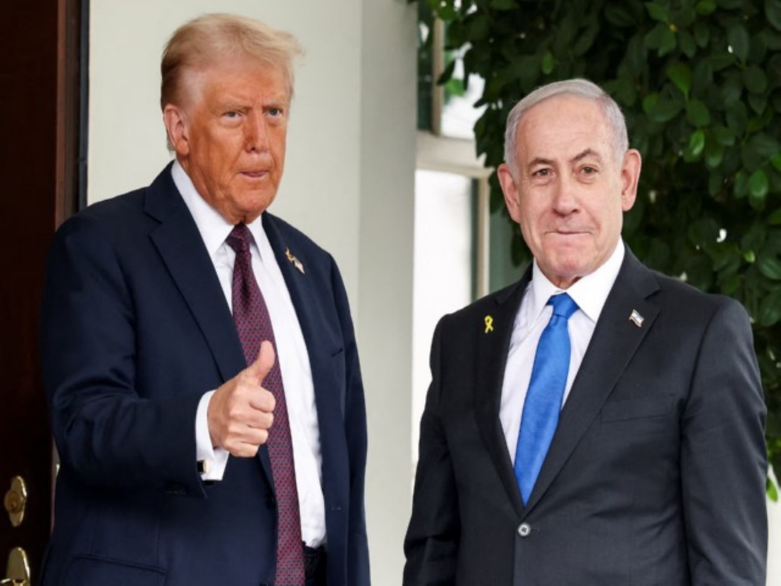 US President Donald Trump gestures with a thumbs up while welcoming Israeli Prime Minister Benjamin Netanyahu at the White House in Washington, DC, US. (File Photo/Reuters)