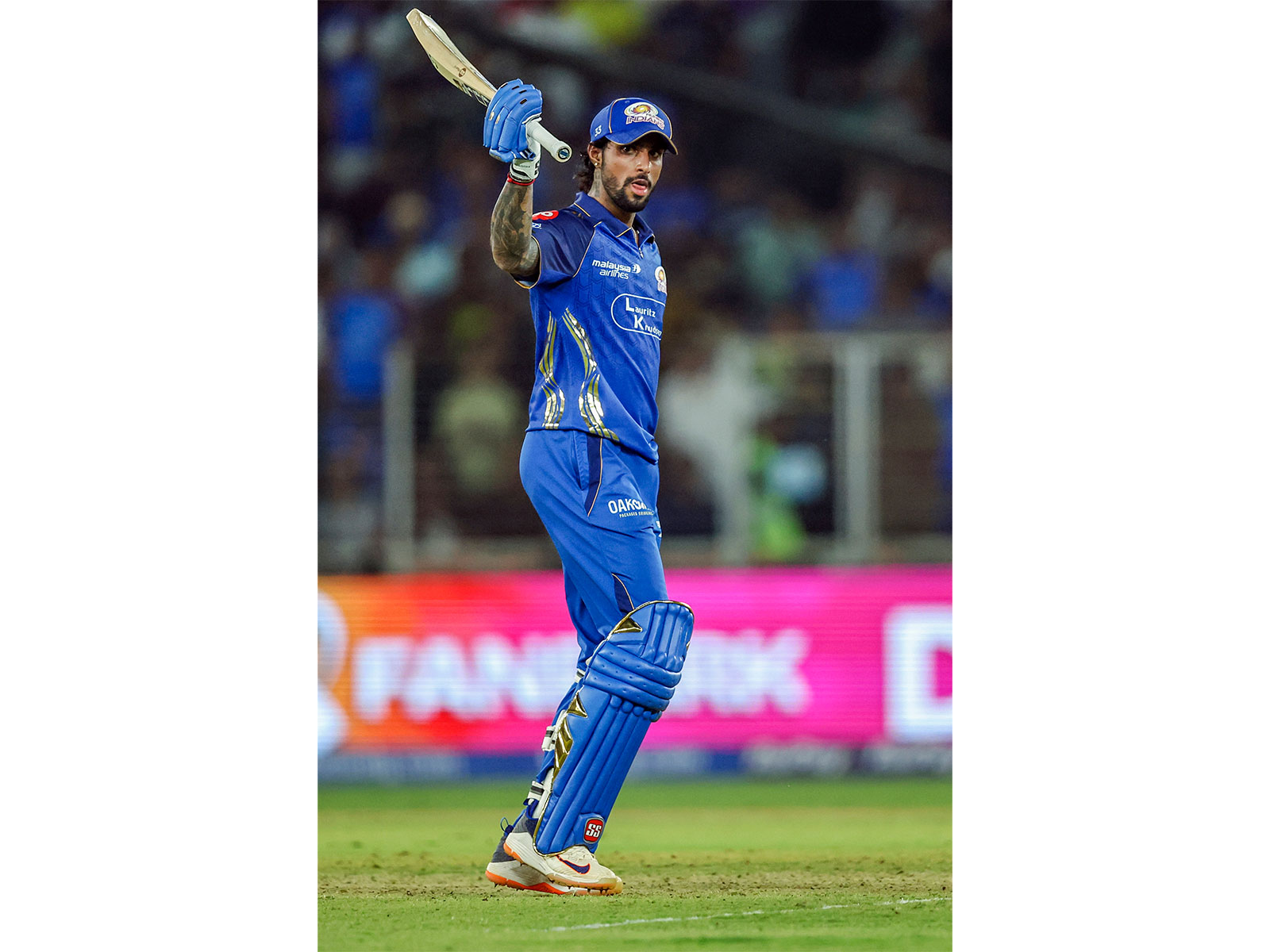 MI batter Tilak Varma celebrating (Photo: ANI)