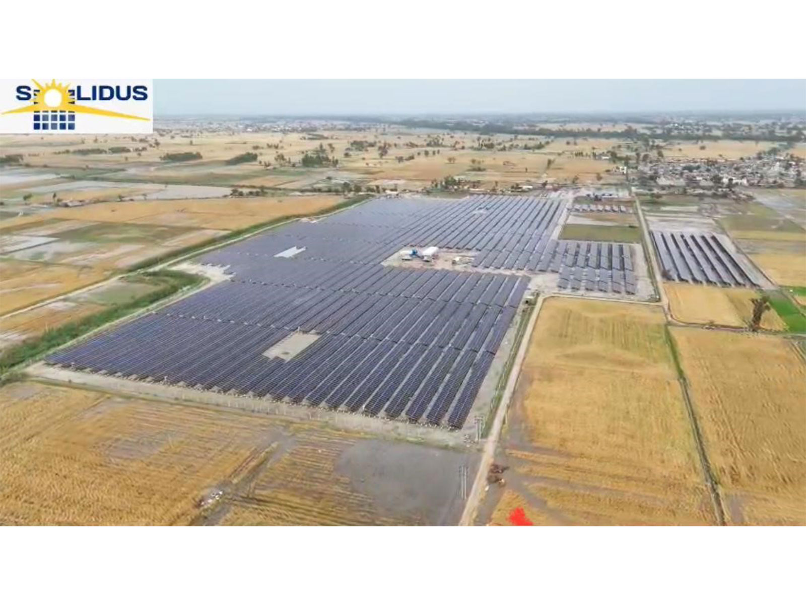 An aerial view of Punjab's largest solar project in Fazilka, the 40MW/60MWp plant by Solidus powers industries with clean energy, driving decarbonisation and sustainable growth