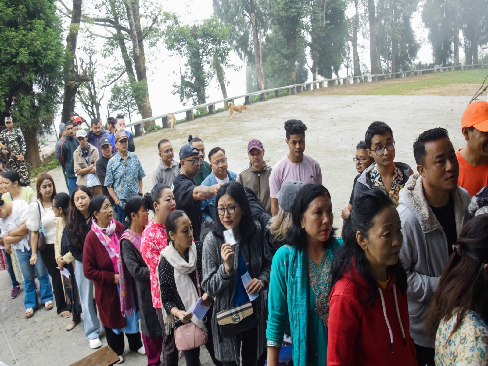 Voters queue up as they wait to cast their votes during the first phase of the West Bengal Assembly elections 2026 at a polling station, in Darjeeling (Photo/ANI)