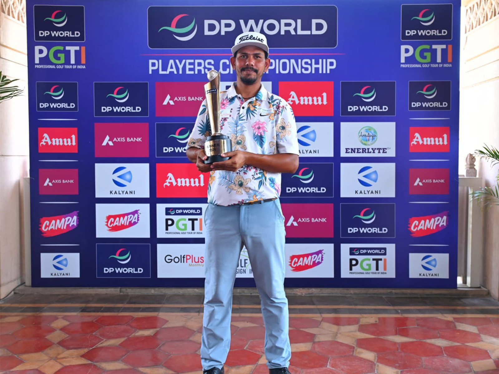 Akshay Sharma with winners Trophy (Photo/PGTI) 