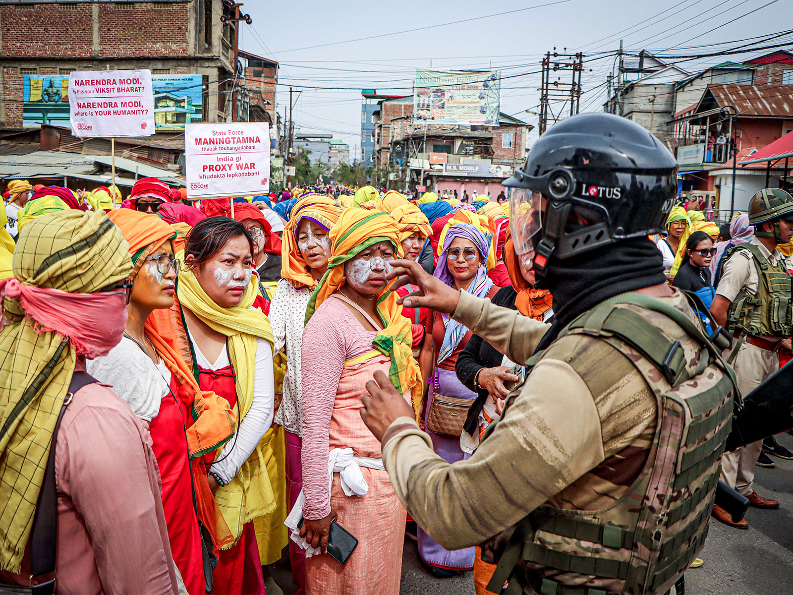 Security personnel trying to disperse a crowd as COCOMI stage massive public rally (Photo/ANI)