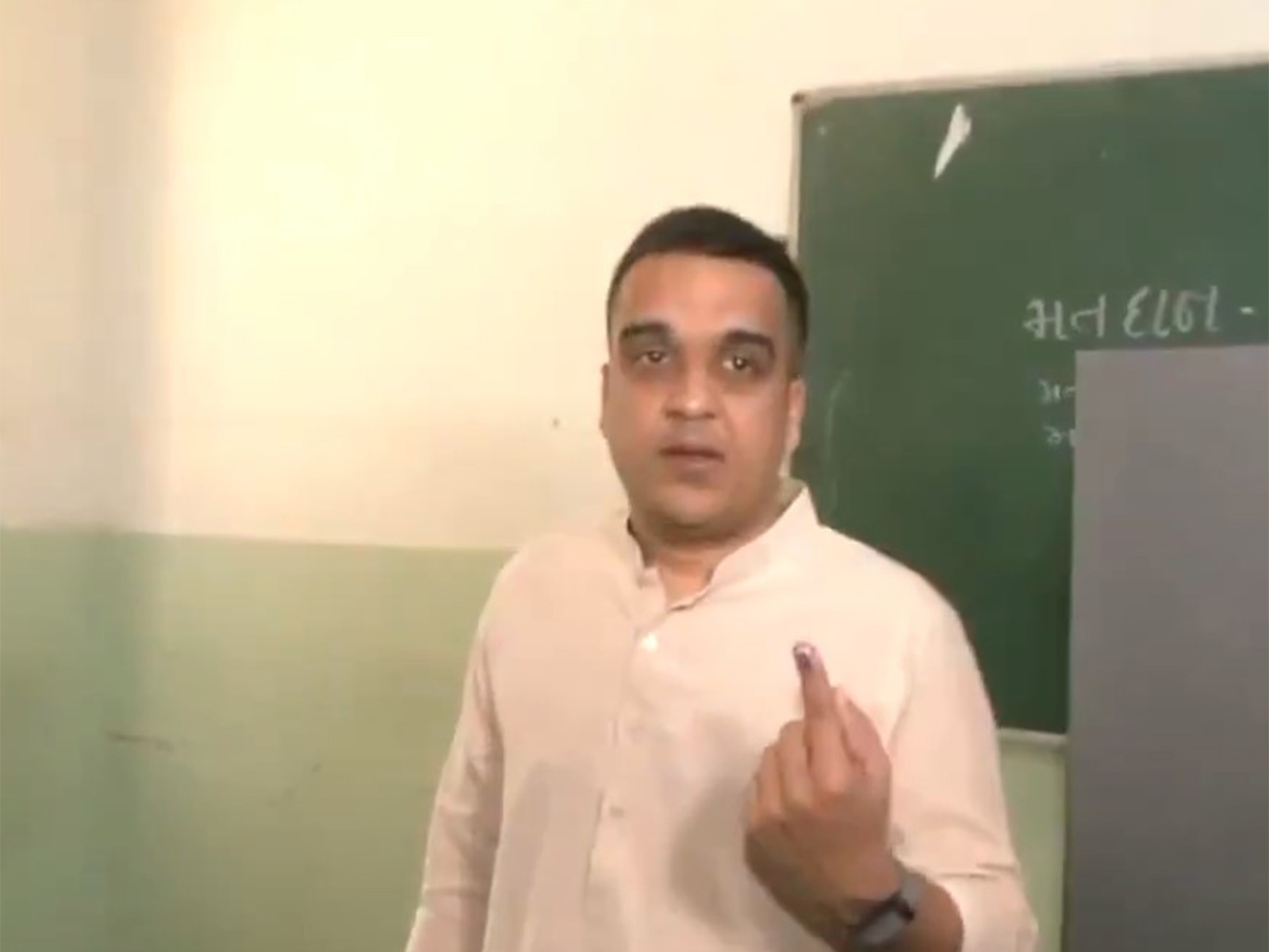 Gujarat Deputy Chief Minister Harsh Sanghavi casts his vote in Surat during local body polls (Photo/ANI) 