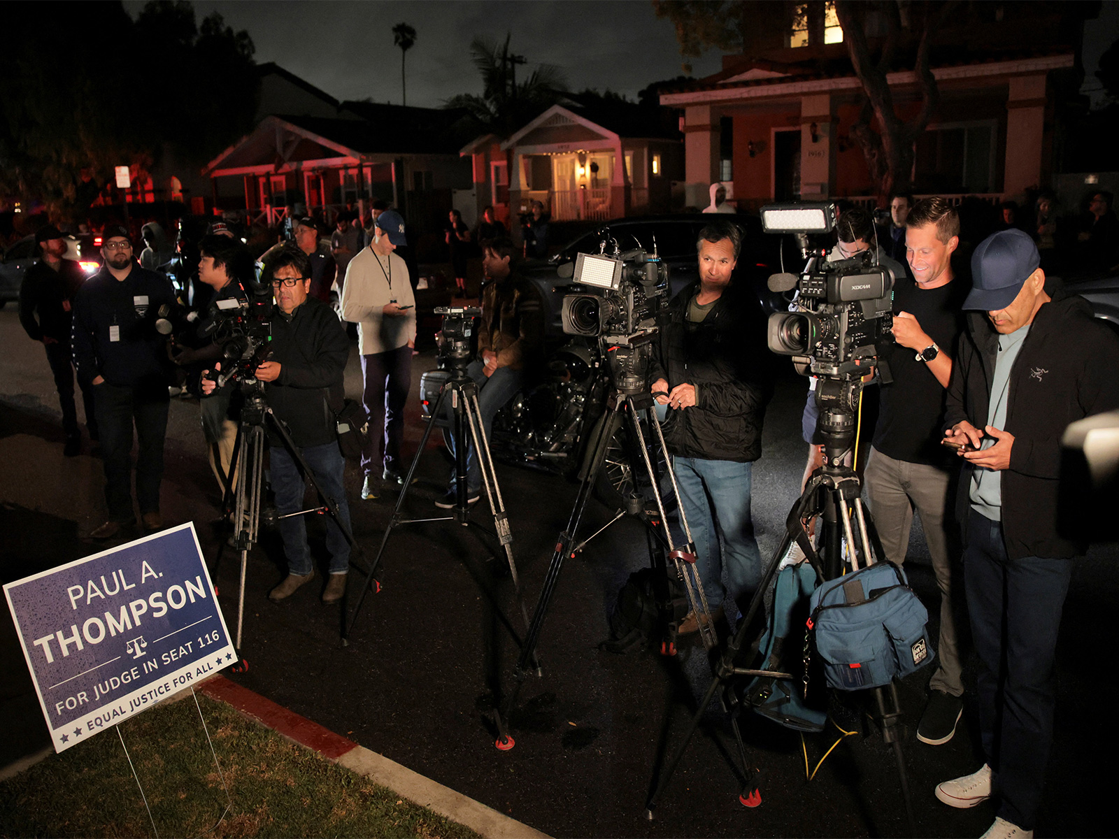 Members of the media gather outside the residence associated with Cole Tomas Allen, the suspect in the shooting incident at the annual White House Correspondents' Association dinner in Washington DC (Photo/Reuters)