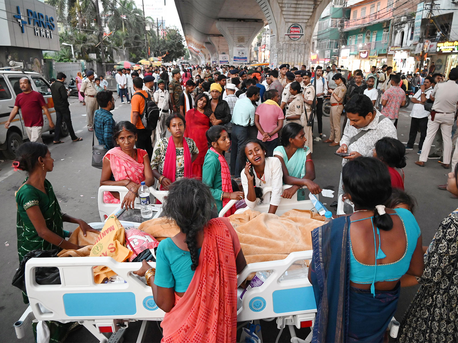 Police deployed as angry relatives of a deceased boy take to the streets with an ICU bed (Photo/ANI)