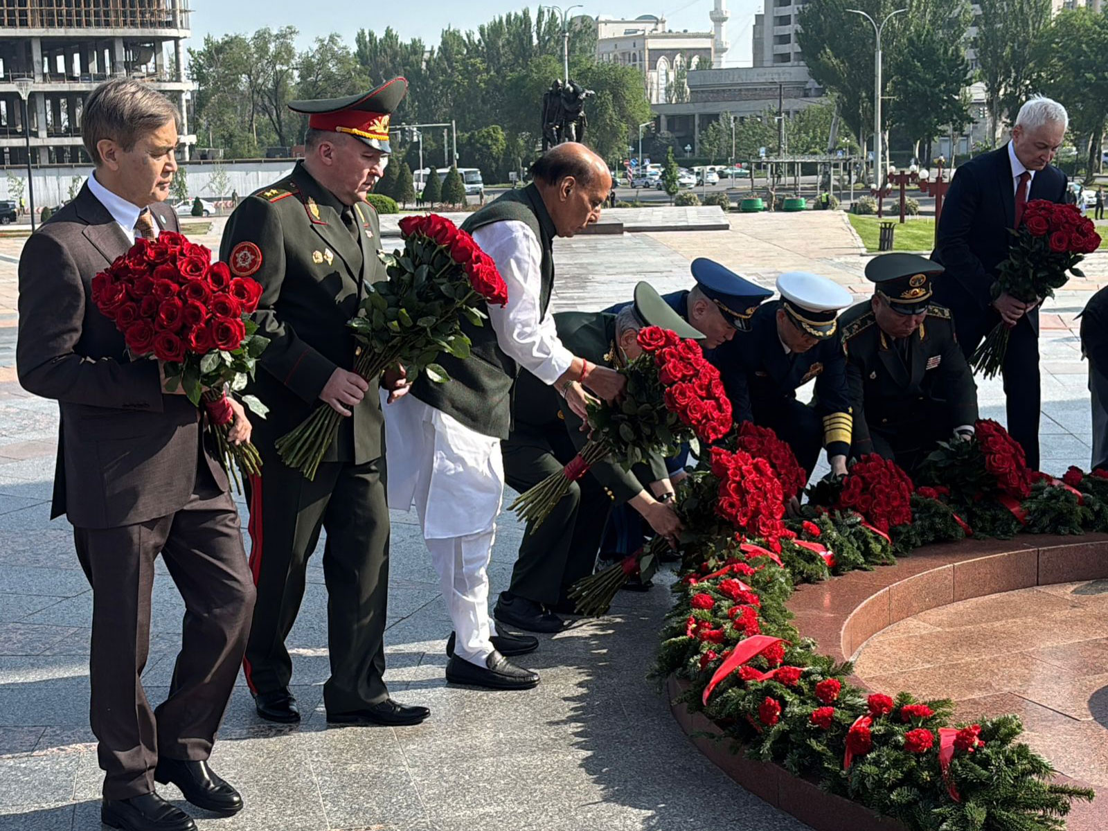 Defence Minister Rajnath Singh lays a wreath at Victory Square in Bishkek. (Photo/ANI)