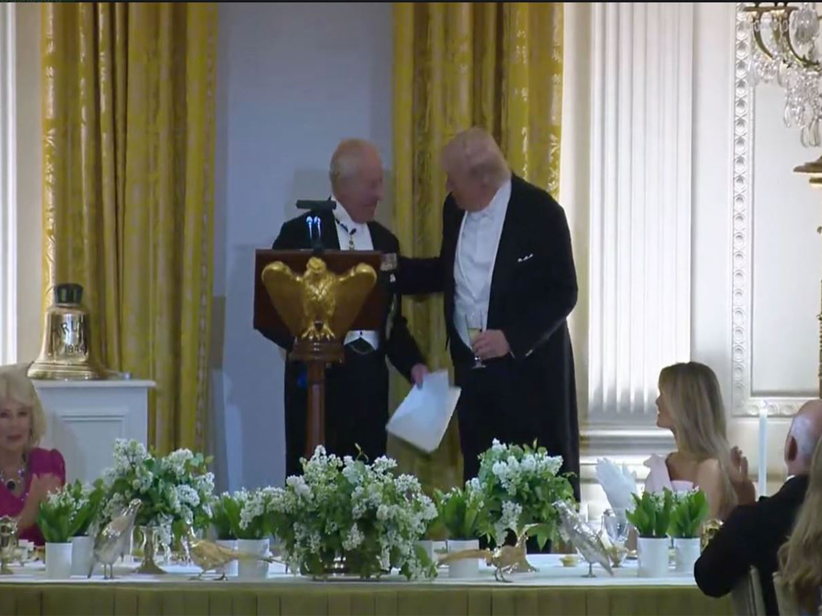Britain's King Charles III presents the historic bell from HMS Trump to President Donald Trump during a state dinner at the White House. (Image Source: White House/YouTube)