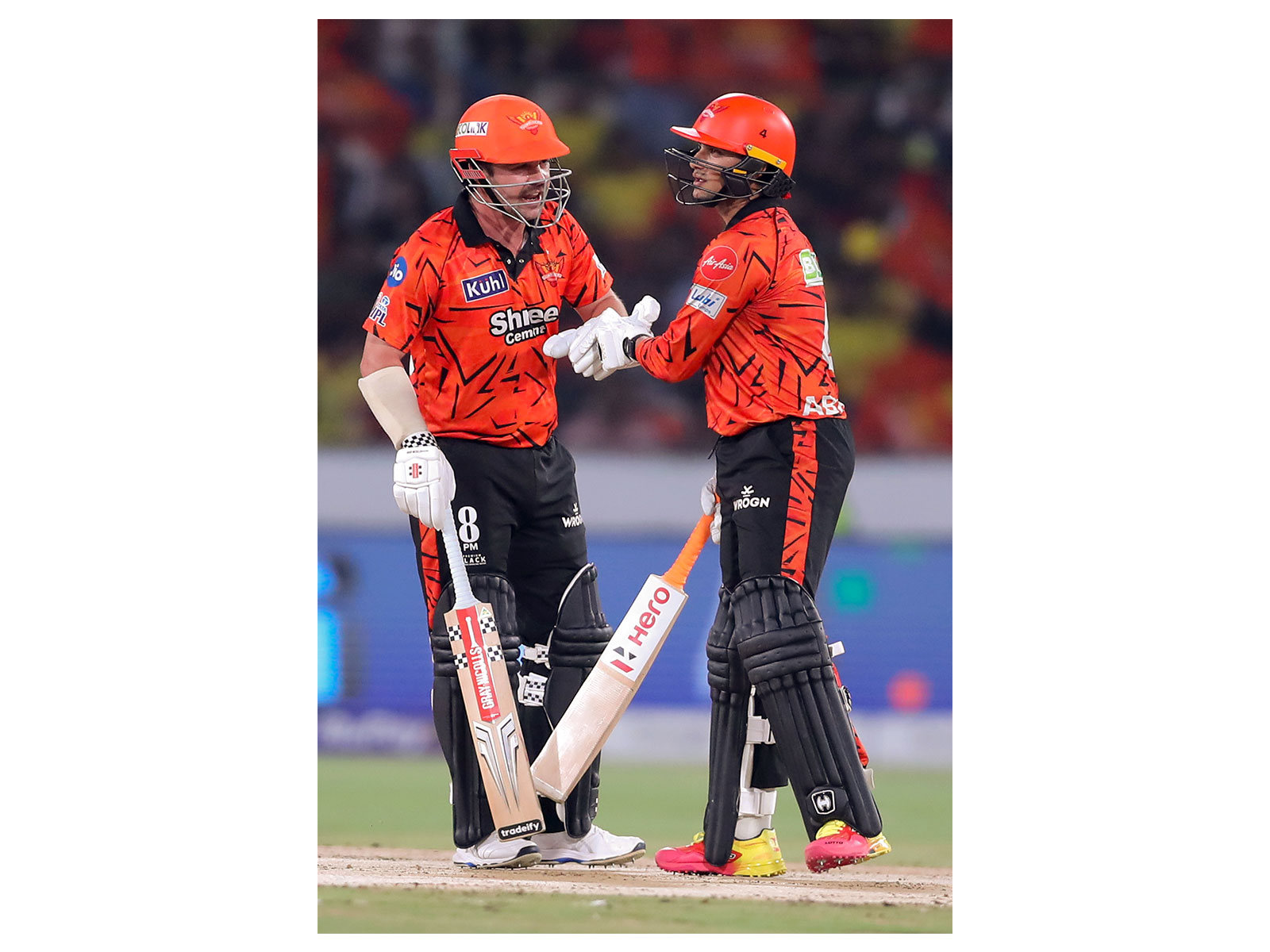 SRH openers Travis Head (L) and Abhishek Sharma (R) in action (Photo: ANI)