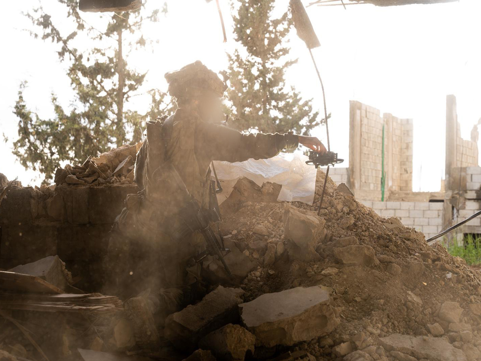 An Israeli soldier operates amid rubble during a military operation in southern Lebanon (Photo: X/@IDF)