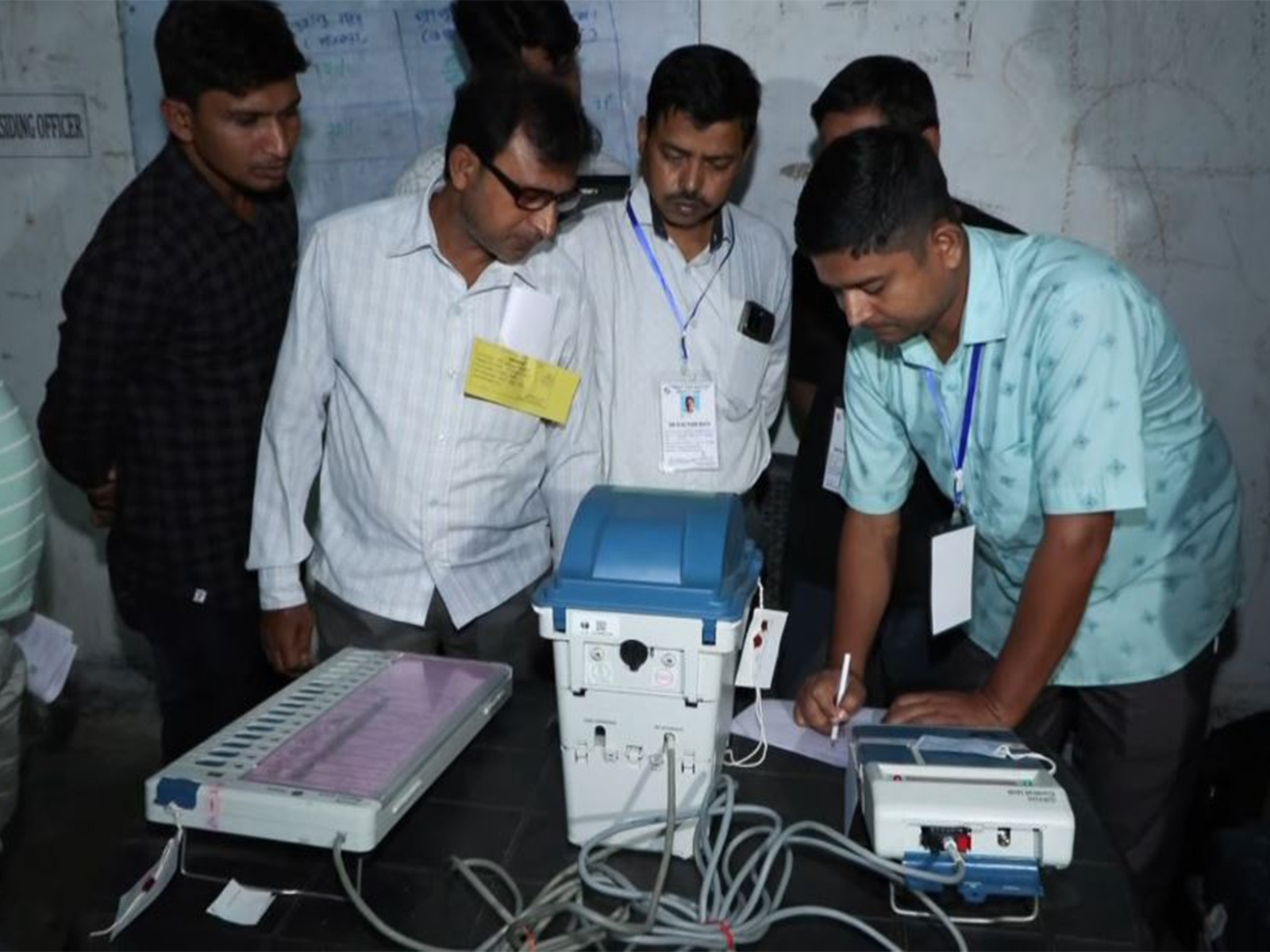 Polling officials at Booth no 117 in South Parganas (Photo/ANI)
