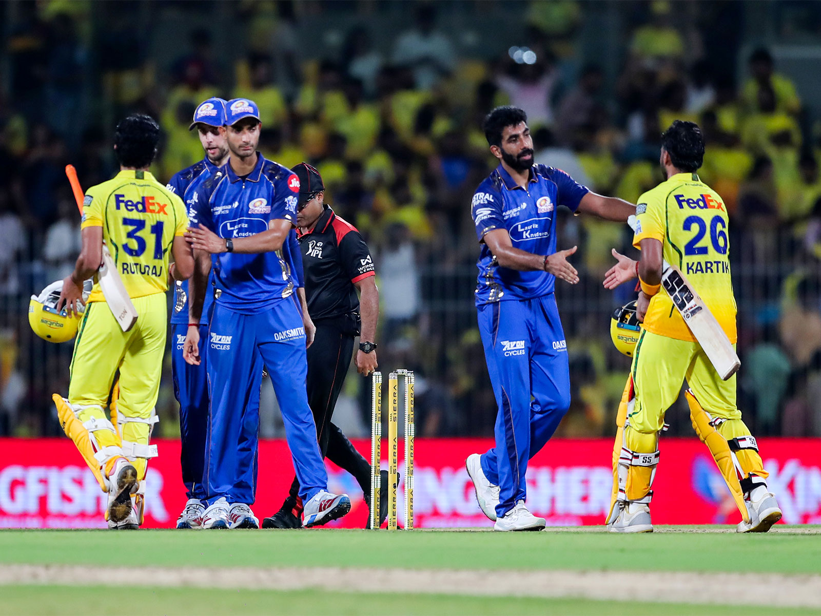 MI and CSK players greeting each other after the match. (Photo/ANI)