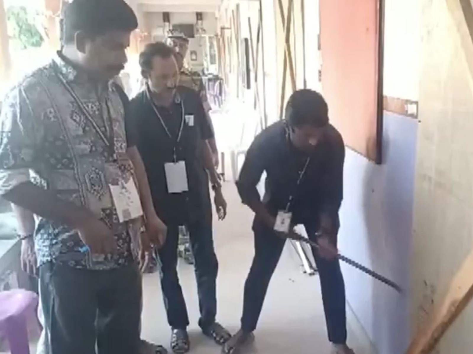 EC representatives open a strong room at a counting centre (Photo/ANI)