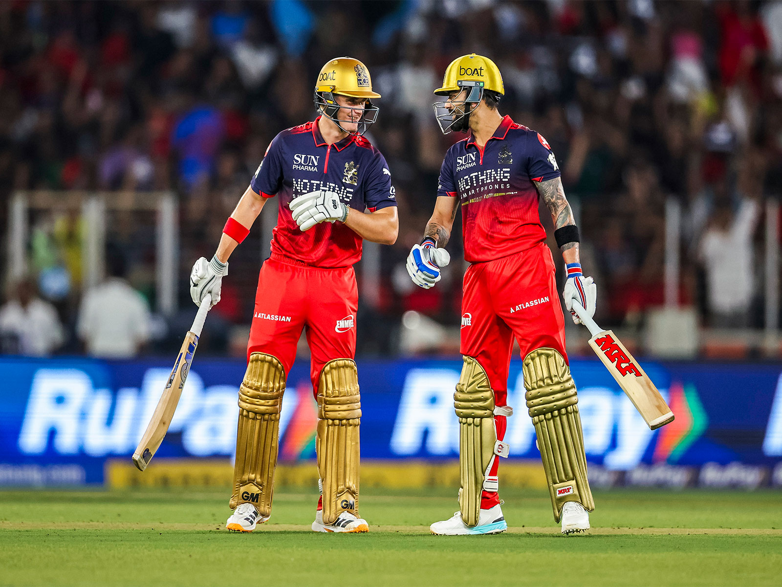 Jacob Bethell (L) and Virat Kohli (R). (Photo: ANI)