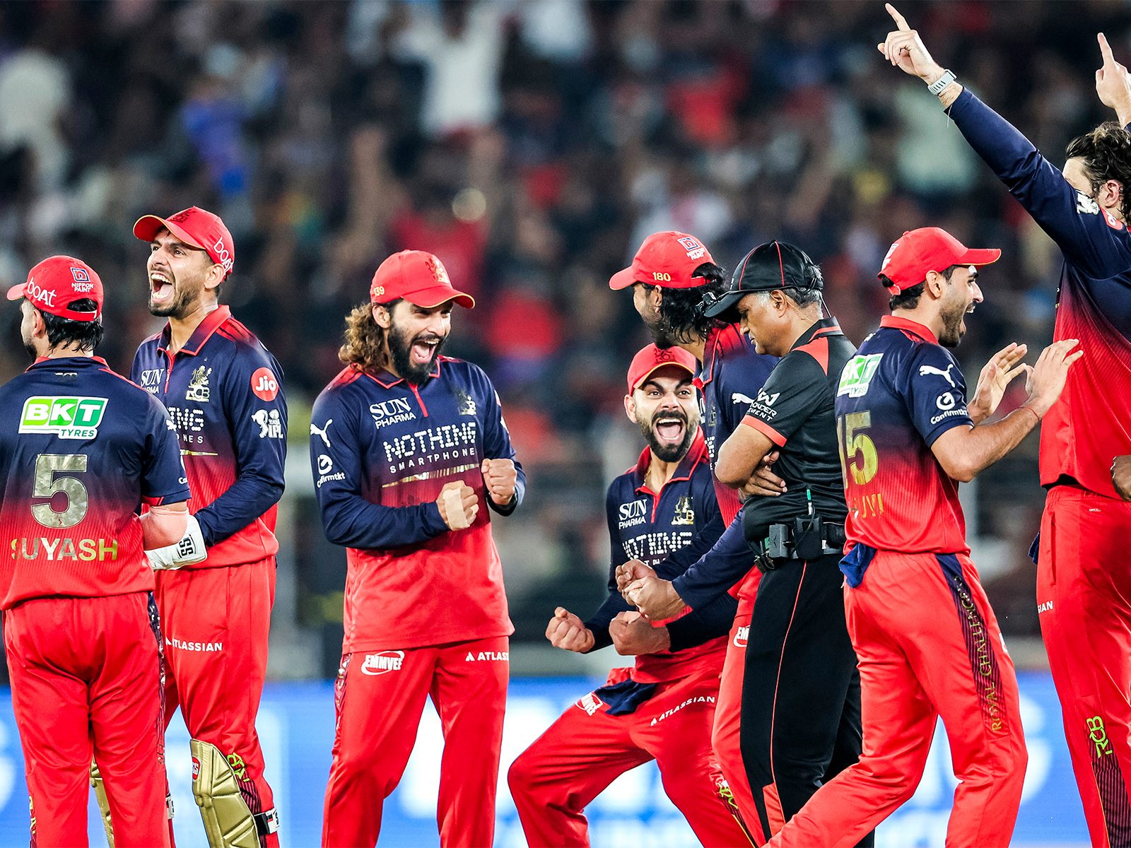 RCB players celebrating after a wicket in IPL 2026. (Photo/ANI)