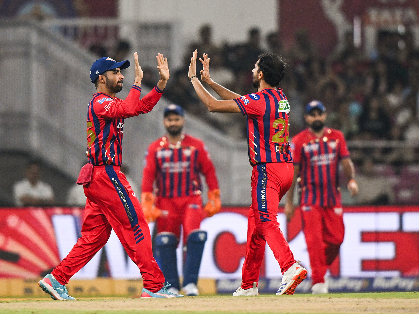 LSG team celebrating a wicket (Photo/ANI)