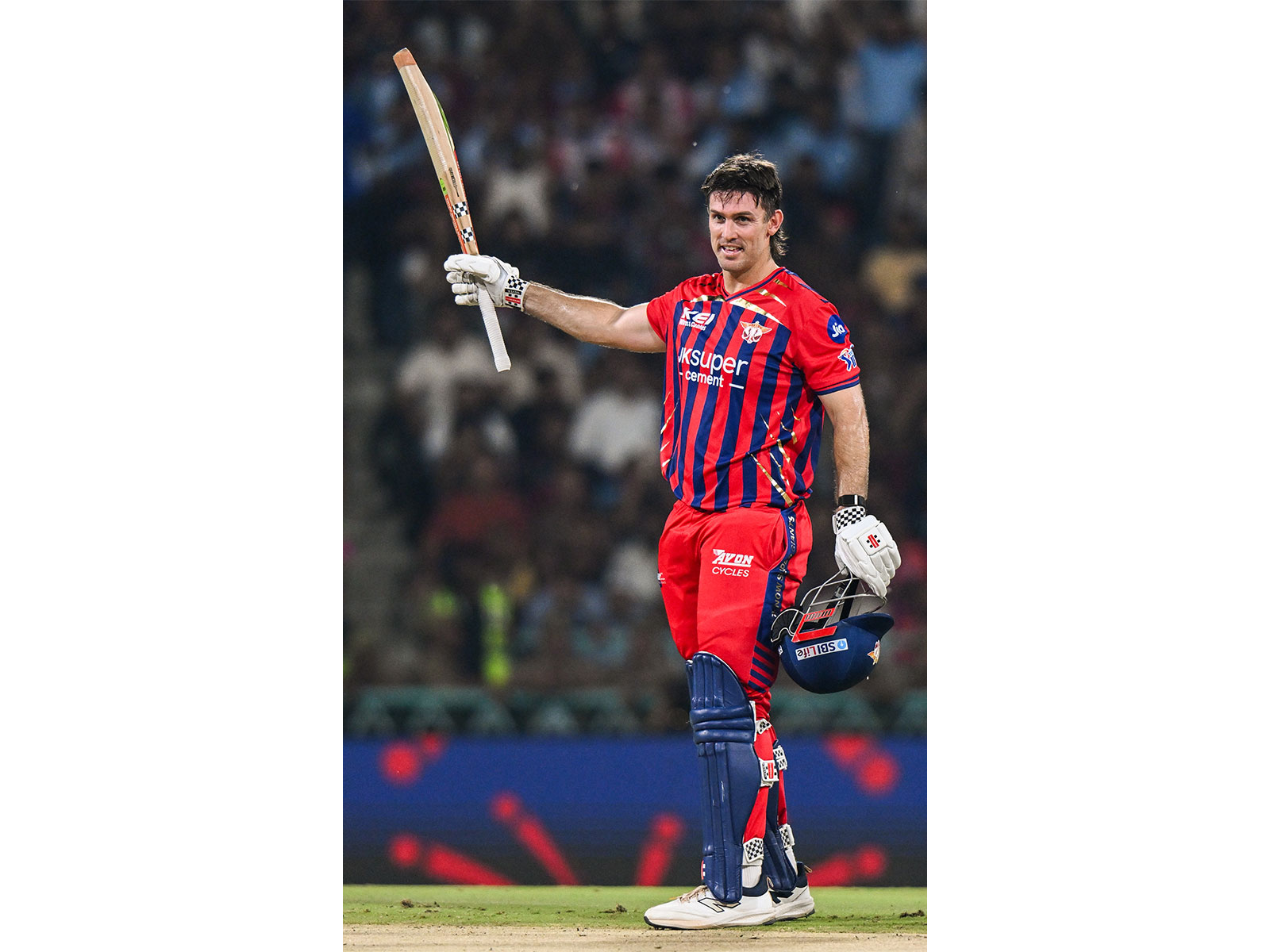 LSG opener Mitchell Marsh celebrating after hitting century (Photo: ANI)